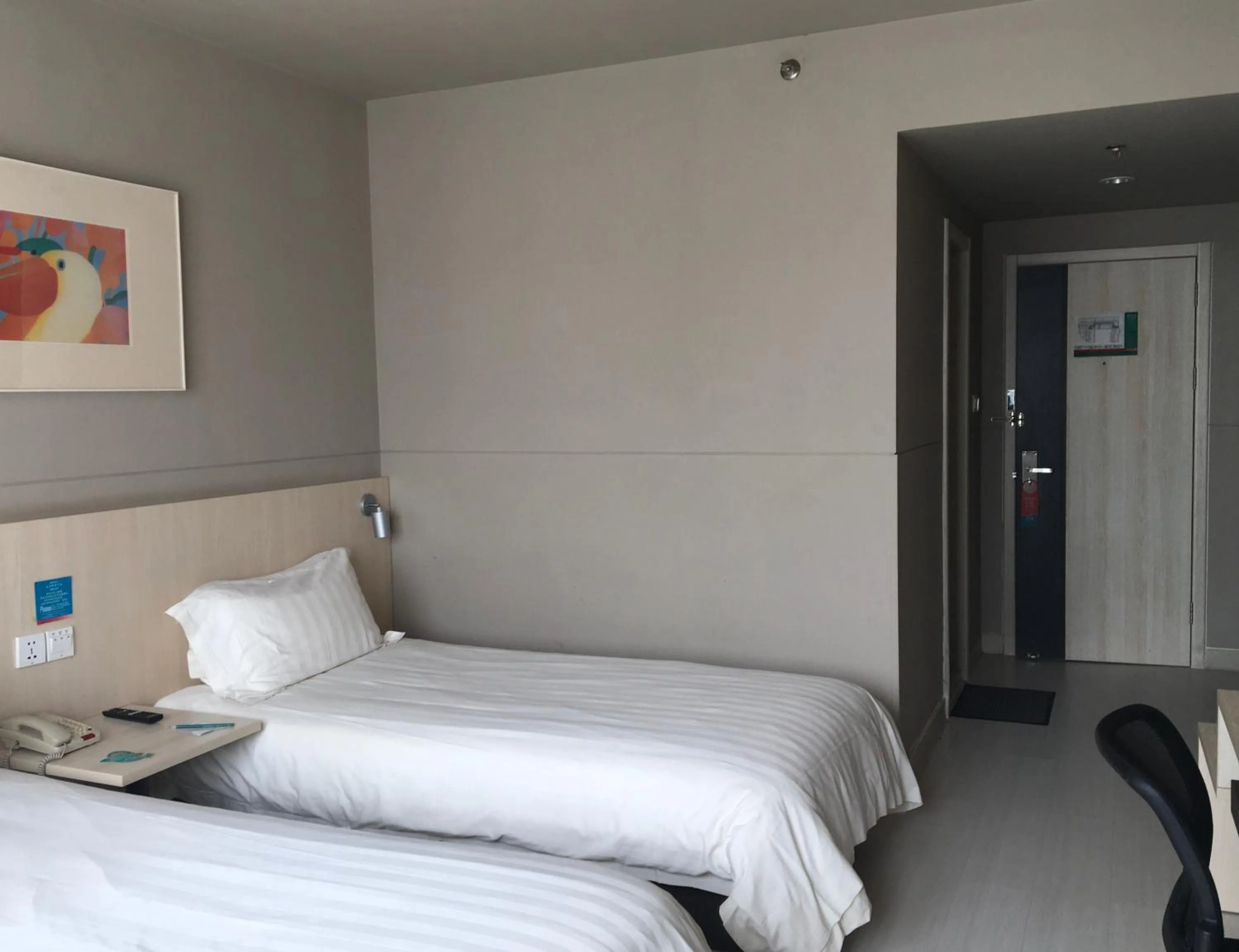 Bed in Jinjiang Inn Lijiang Ancient City Qixing Street