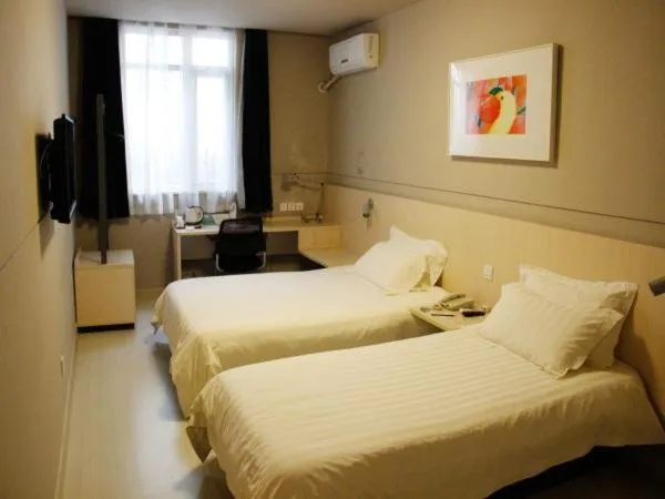 Bed in Jinjiang Inn Chengdu Dufu Thatched Cottage