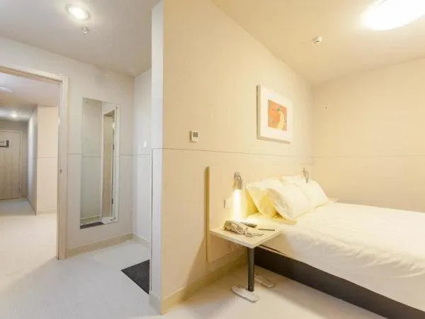 Bed in Jinjiang Inn Anyang Railway Station