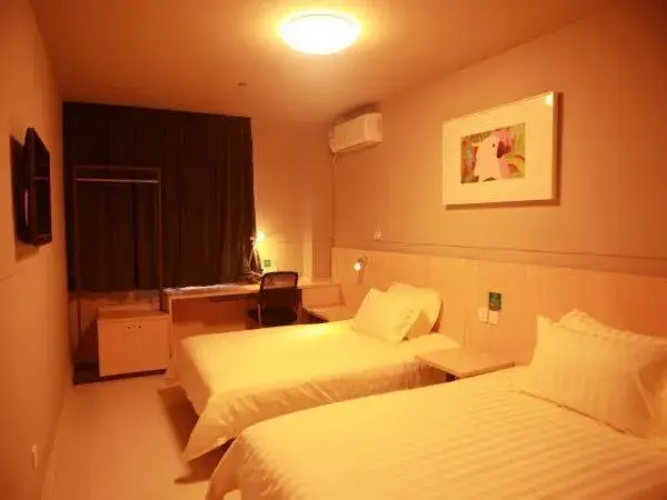 Bed in Jinjiang Inn Suzhou Taihu Xukou Bed in Jinjiang Inn Suzhou Taihu Xukou