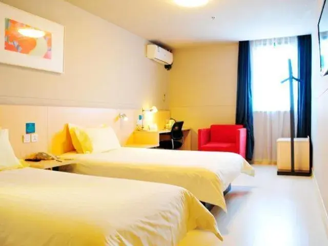 Bed in Jinjiang Inn Suzhou Taihu Xukou Bed in Jinjiang Inn Suzhou Taihu Xukou