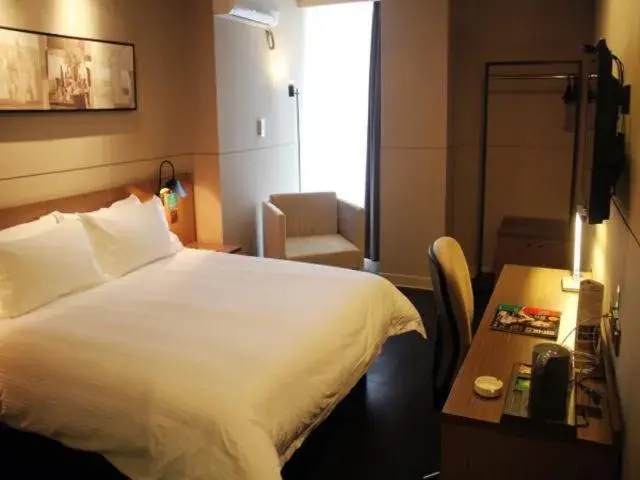 Bed in Jinjiang Inn Select Jiaxing Wanda Plaza Bed in Jinjiang Inn Select Jiaxing Wanda Plaza