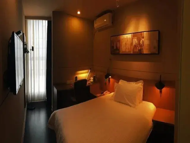 Bed in Jinjiang Inn Select Jiaxing Wanda Plaza Bed in Jinjiang Inn Select Jiaxing Wanda Plaza