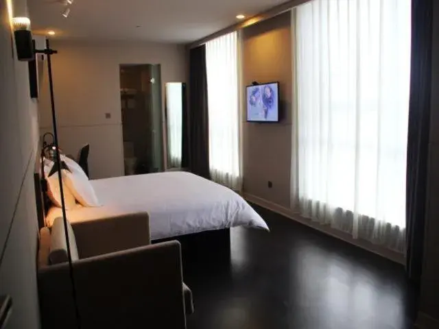 Bed in Jinjiang Inn Select Jiaxing Wanda Plaza Bed in Jinjiang Inn Select Jiaxing Wanda Plaza