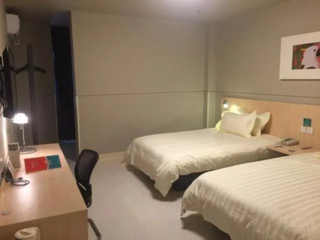 Bed in Magnolia Hotel Cangzhou West Railway Station Jiefang Road