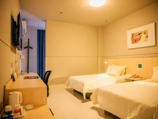 Bed in Magnolia Hotel Cangzhou West Railway Station Jiefang Road Bed in Magnolia Hotel Cangzhou West Railway Station Jiefang Road