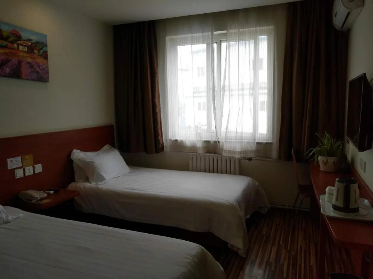 View (from property/room), Bed in Goldmet Inn Beojing Capital Airport Xinguozhan