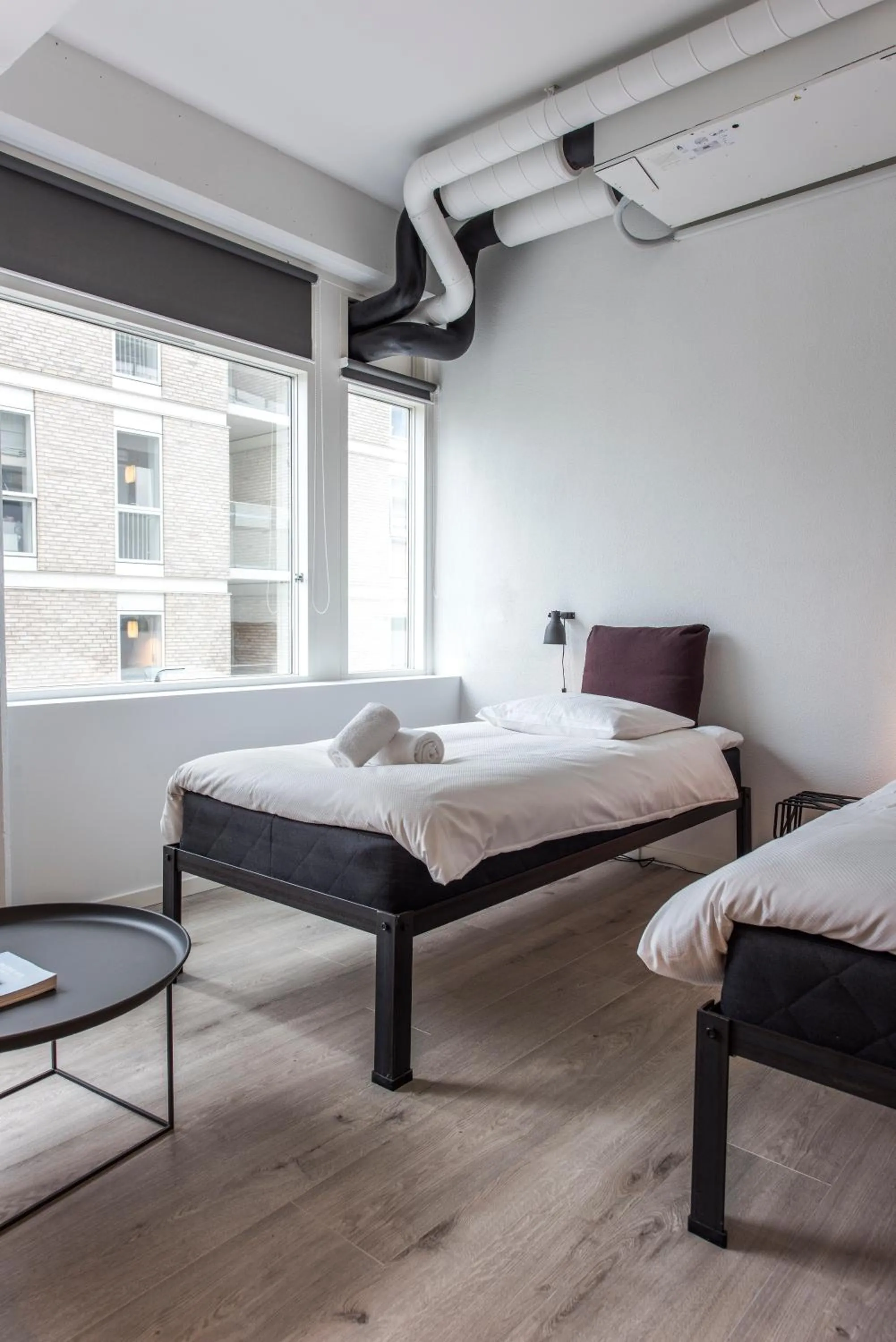 Bed in CPH Studio Hotel