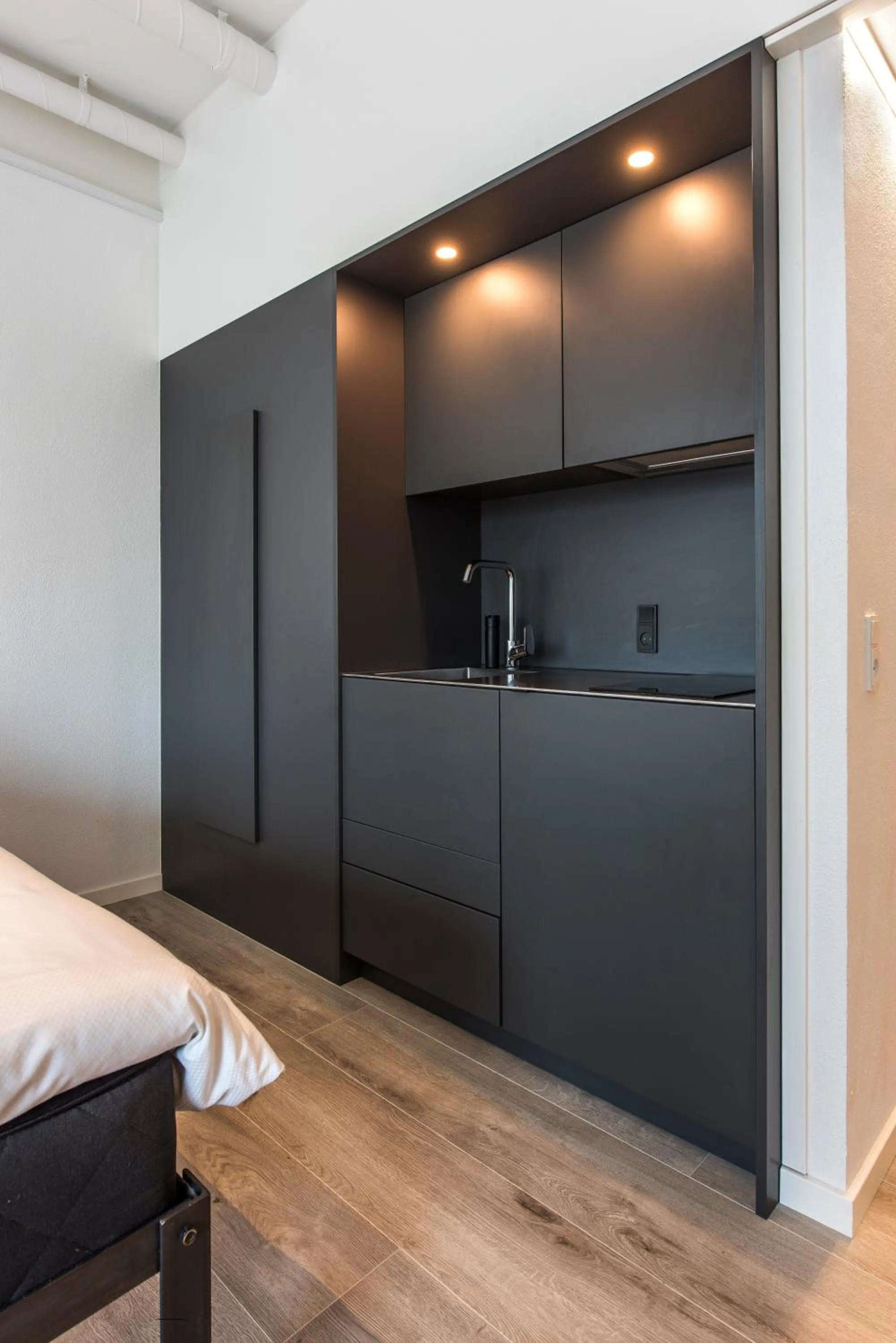 Kitchen or kitchenette, Bed in CPH Studio Hotel