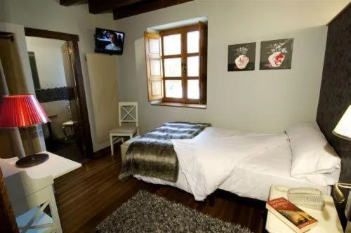 Photo of the whole room, Bed in El Coto Hotel Restaurante