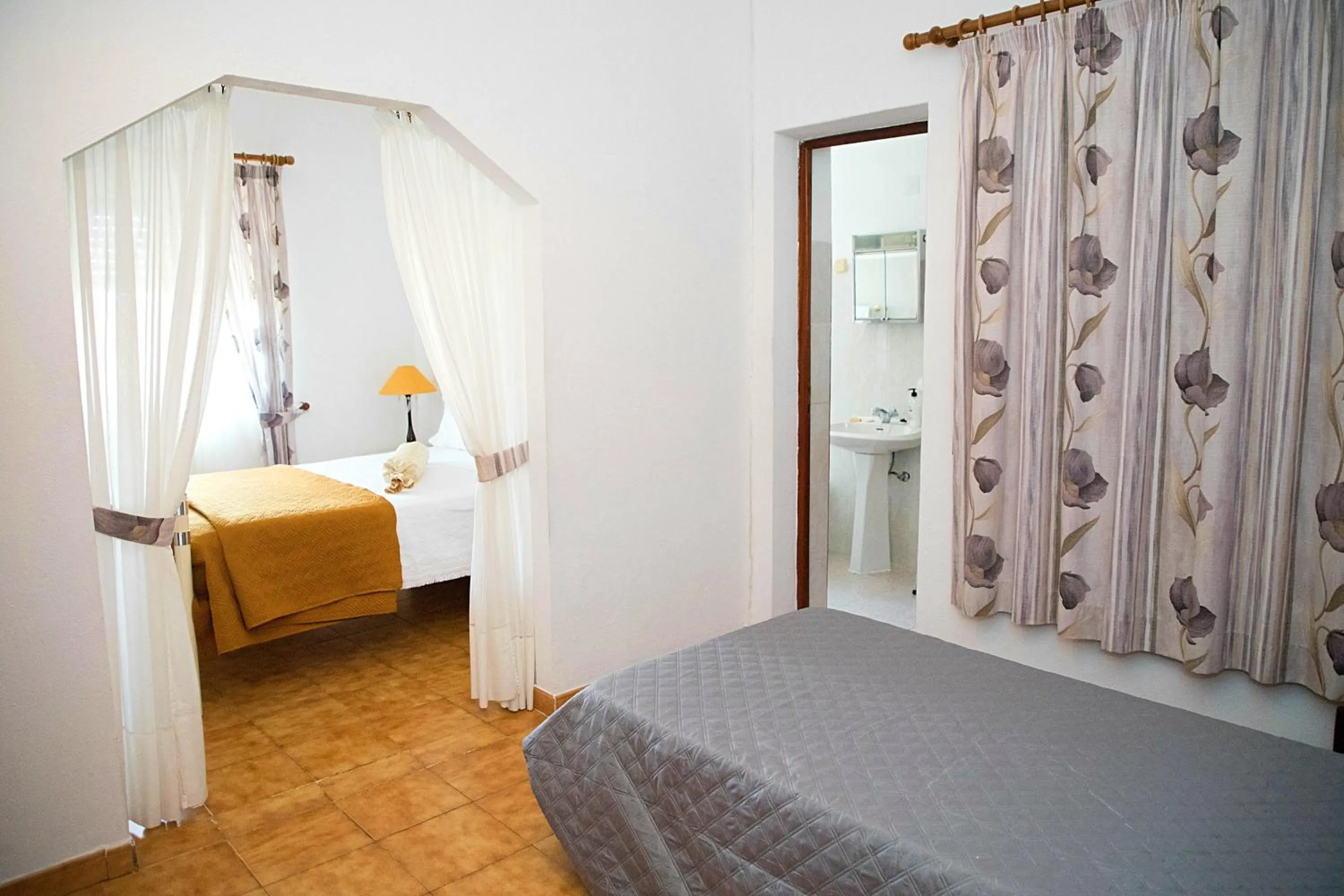 Deluxe Room (2 Adults + 1 Child) in Alojamento Local Familiar
