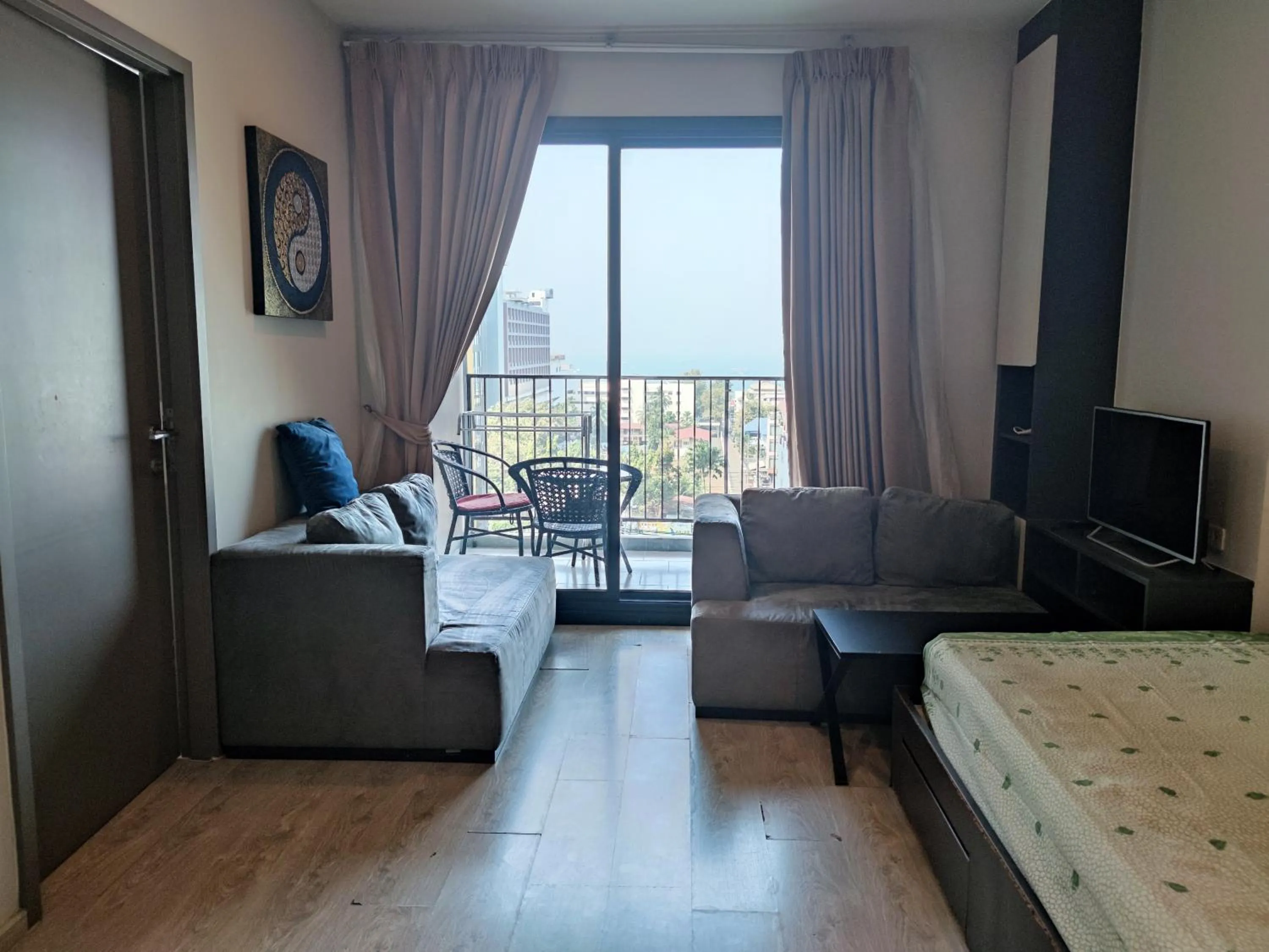 Living room, Bed in Many Holiday The Base Condo