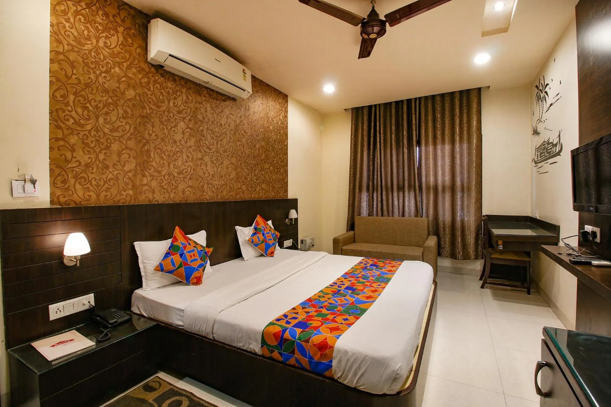 Bed in FabHotel Kamla Regency