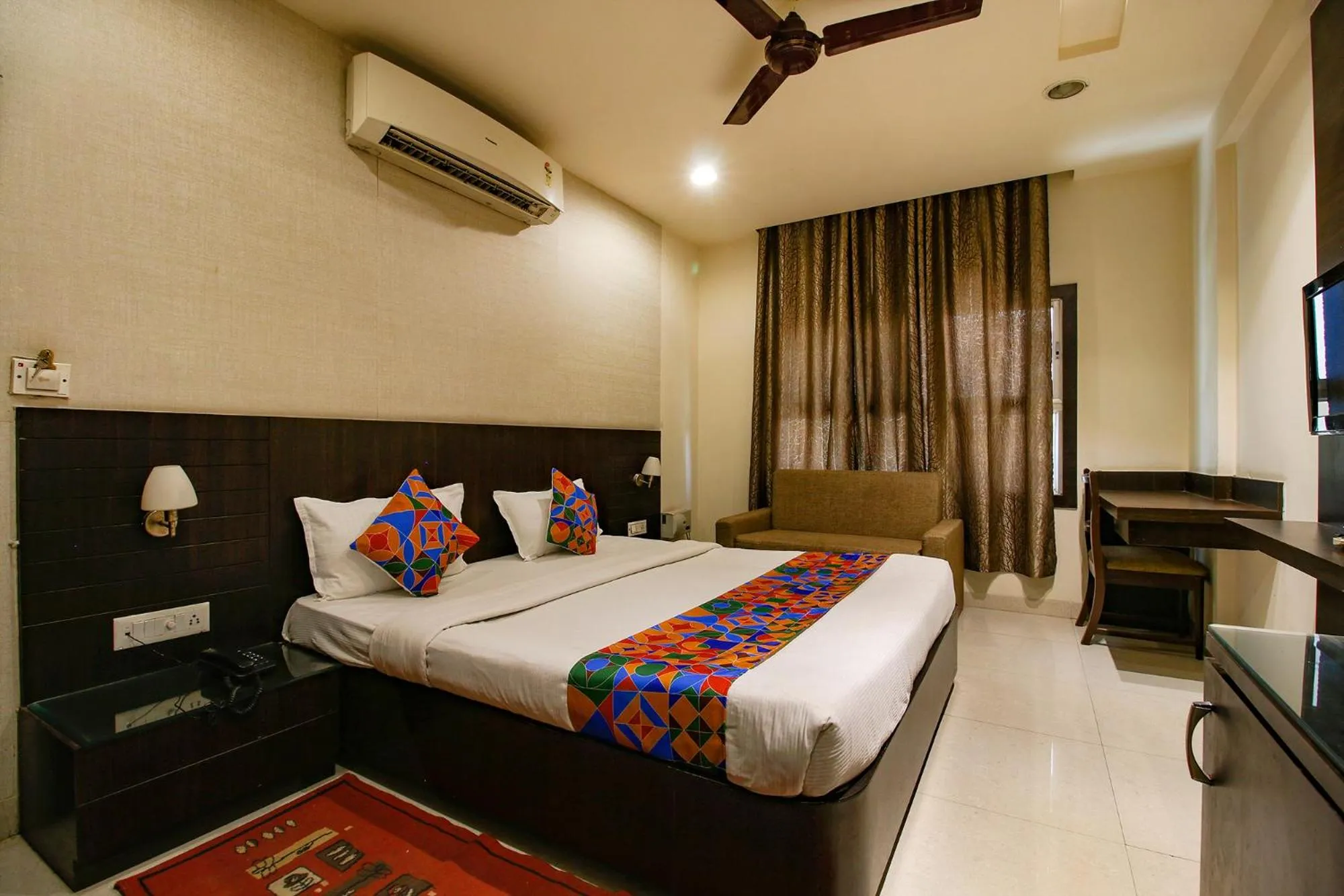 Bed in FabHotel Kamla Regency
