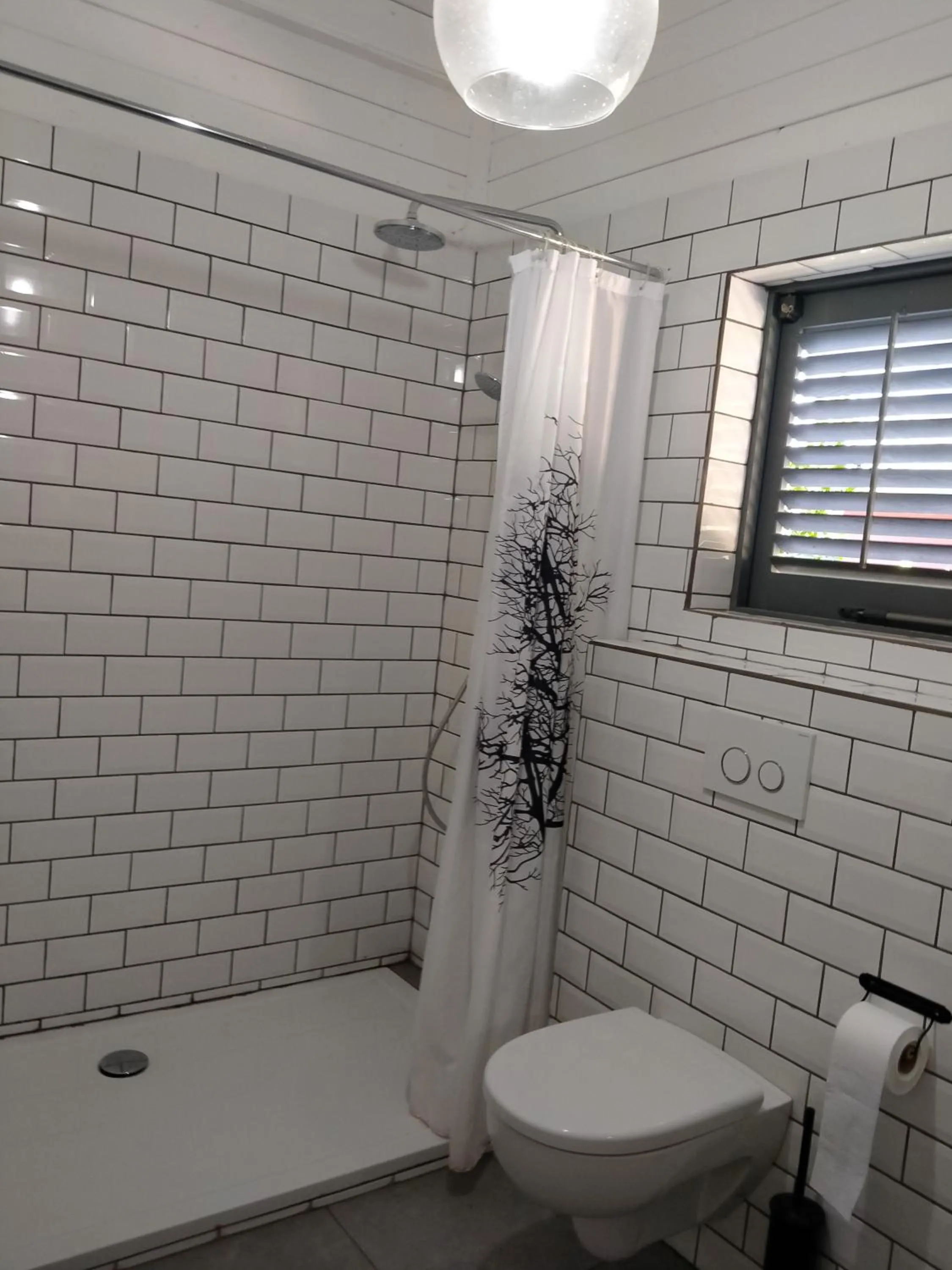 Shower in Red Palm Village