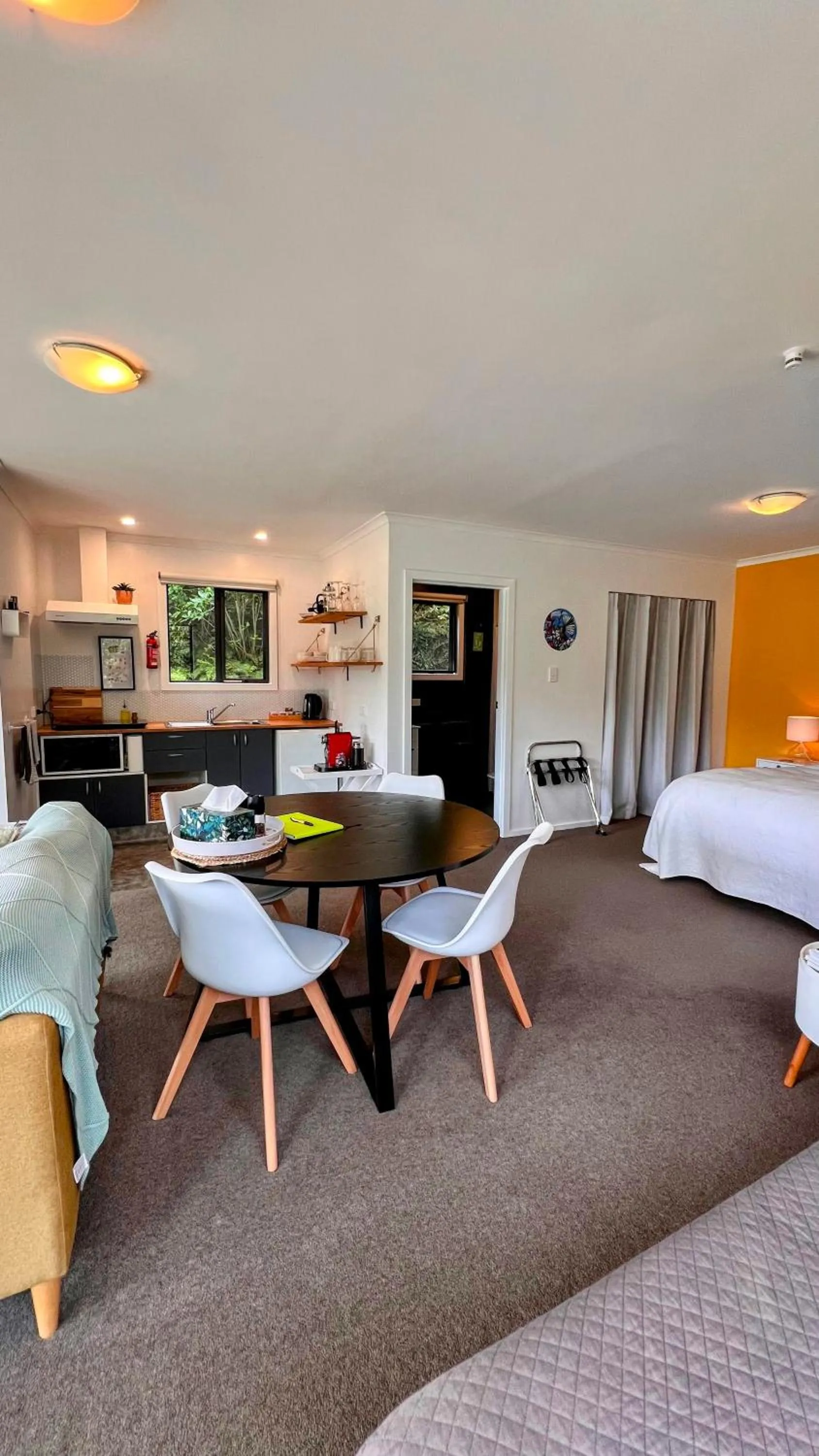Kitchen or kitchenette, Bed in Mohua Park - Catlins Eco Accommodation