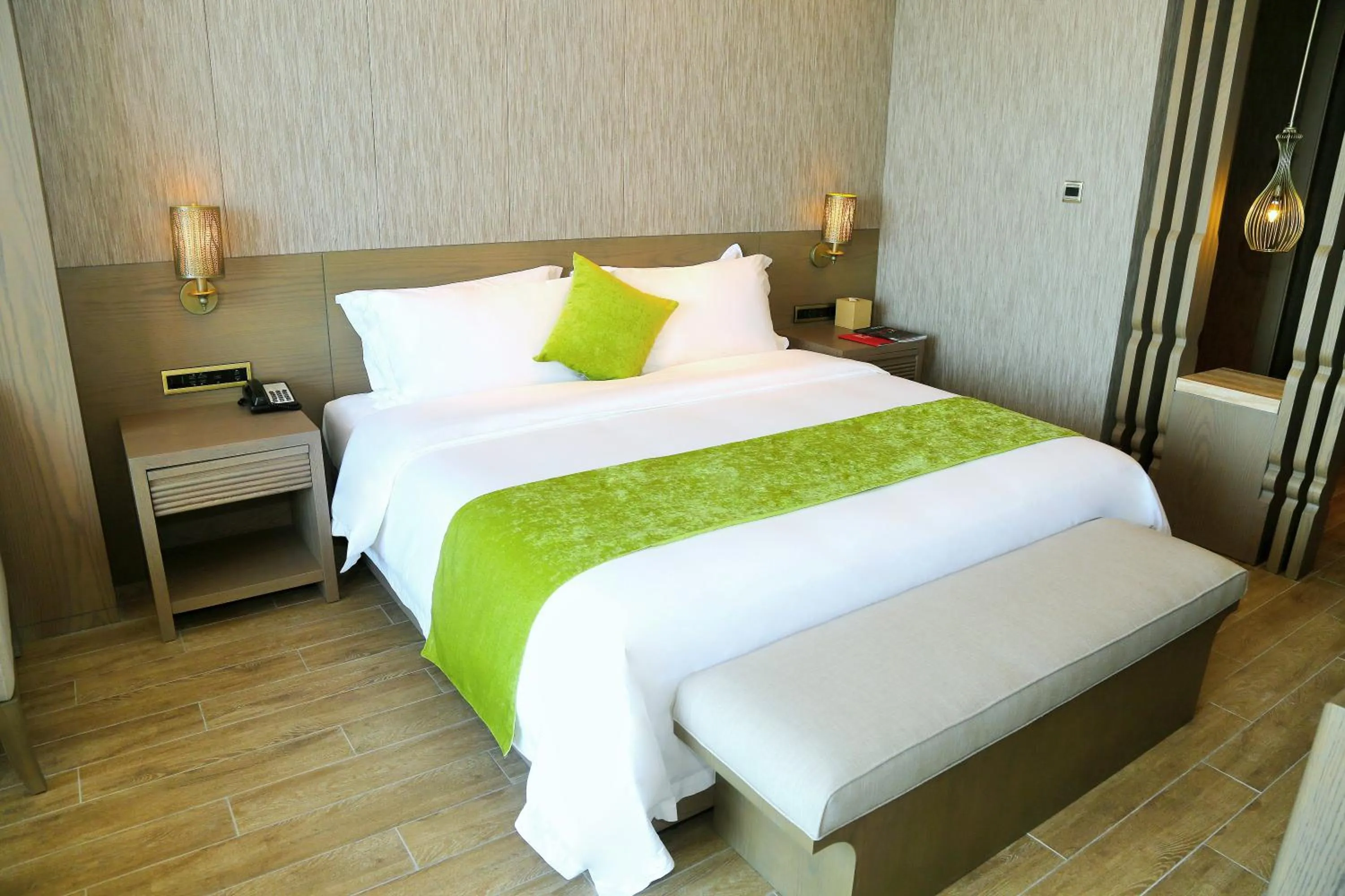 Bed in Qingdao Mangrove Tree Resort World - Red Coral Hotel