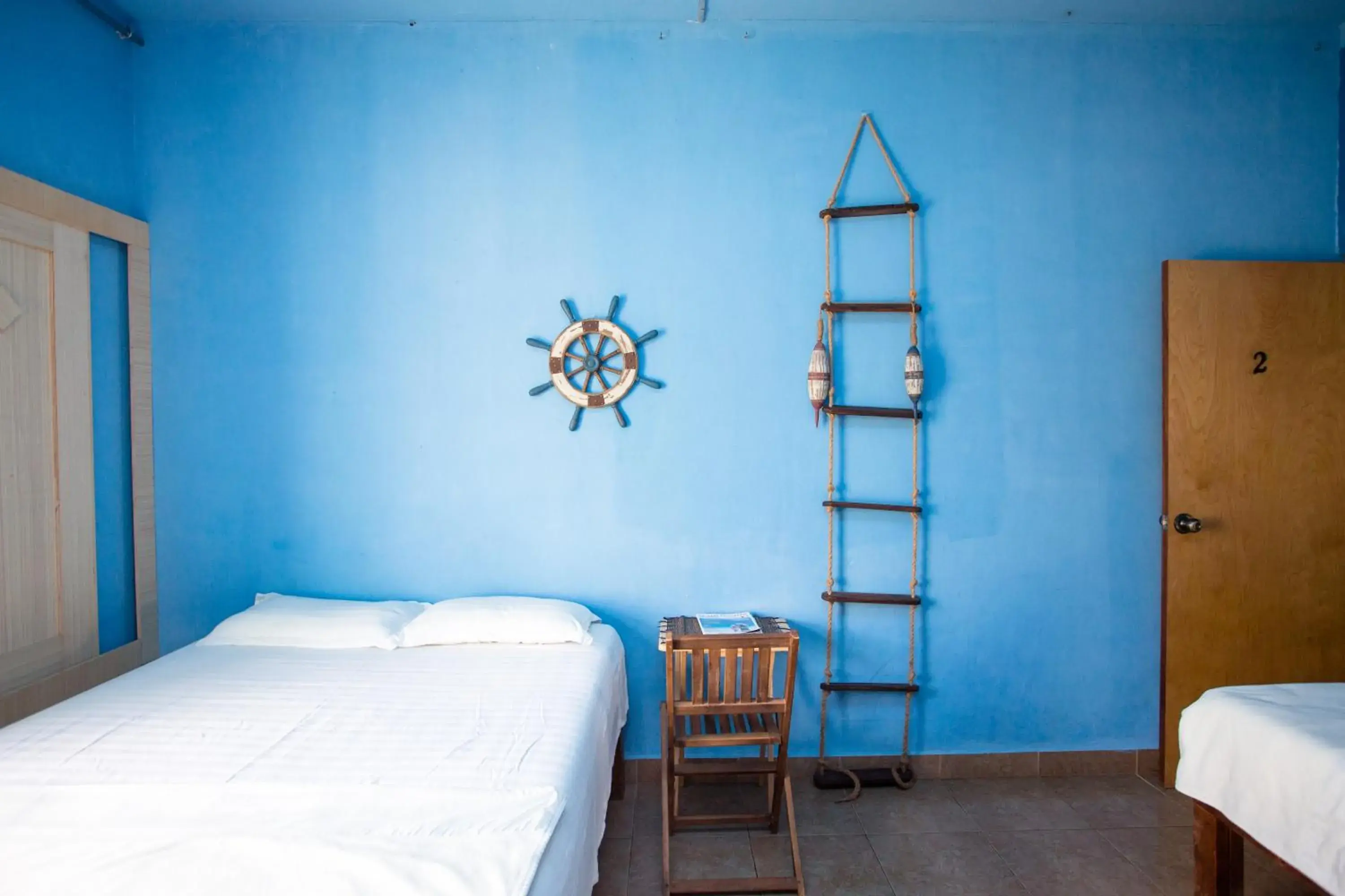 Bed in G.T. Guest House Bed in G.T. Guest House