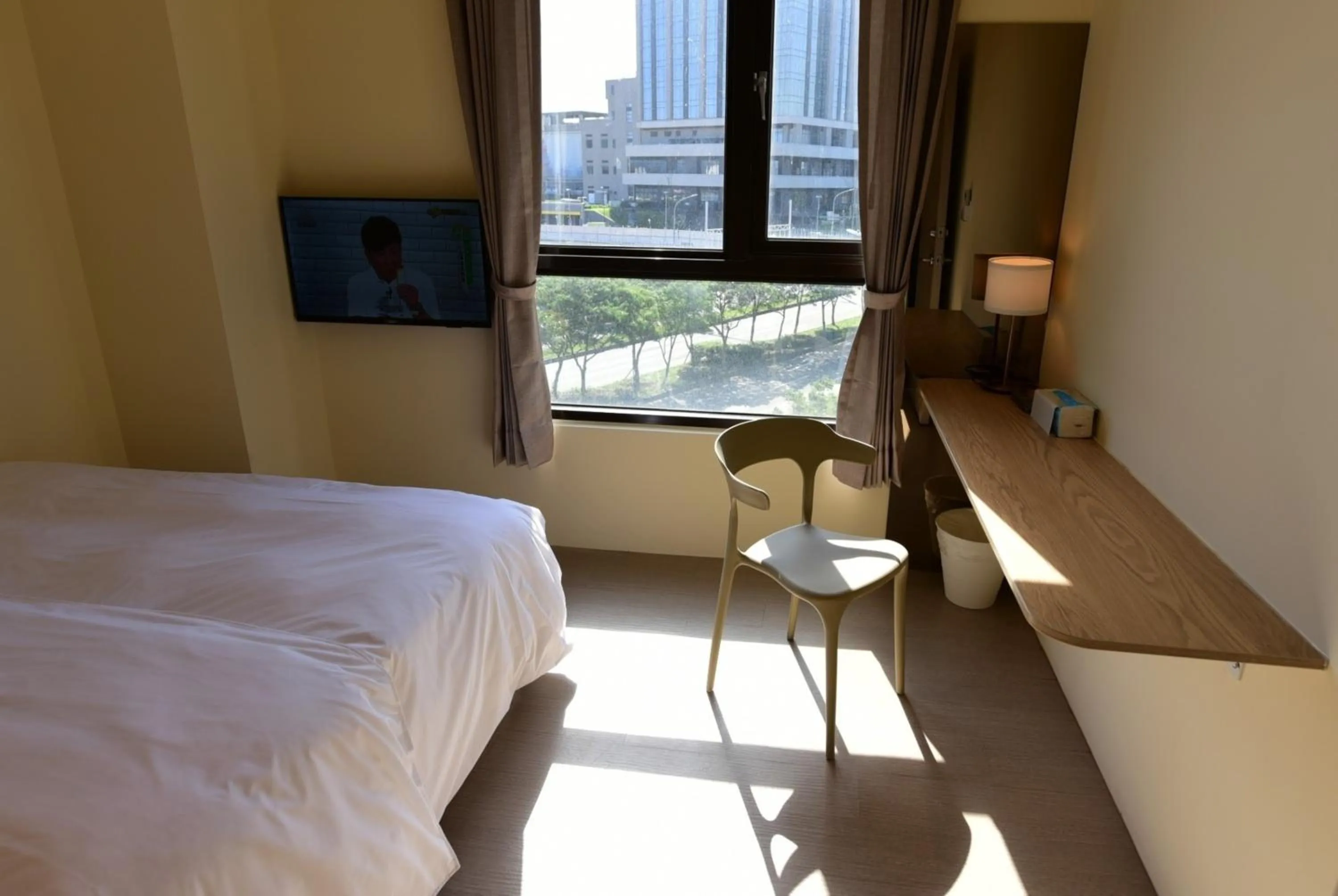 View (from property/room), Bed in Lütel Hotel Xpark Gloria Outlets Shin Kong Cinemas