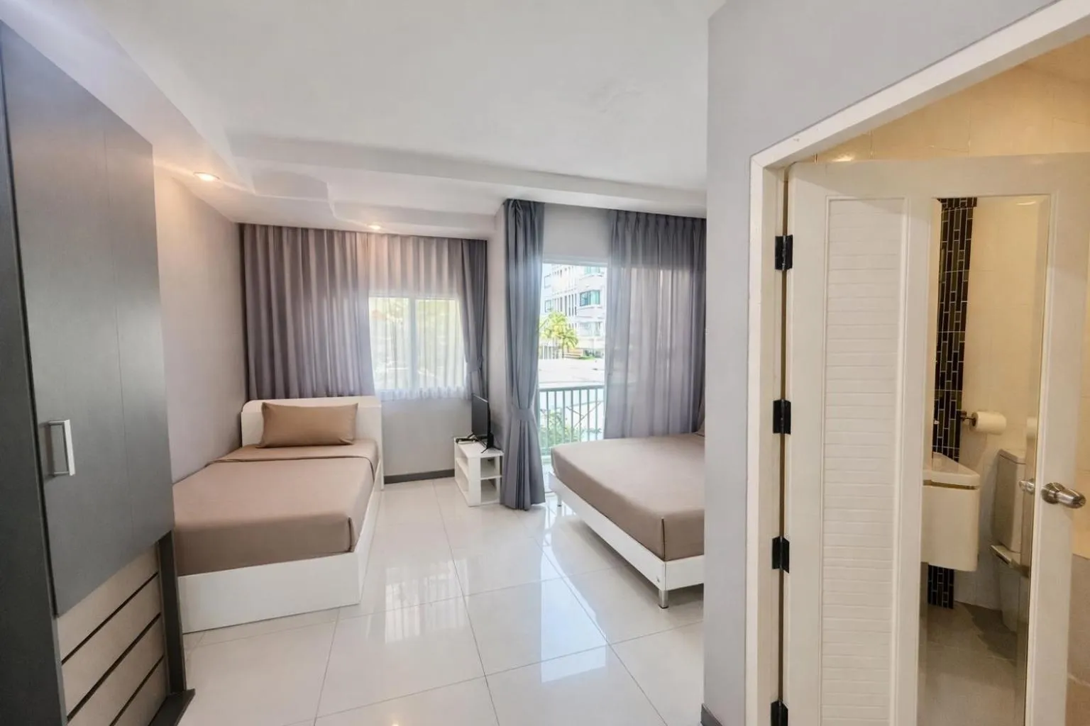 Bed in The Sriracha Residence