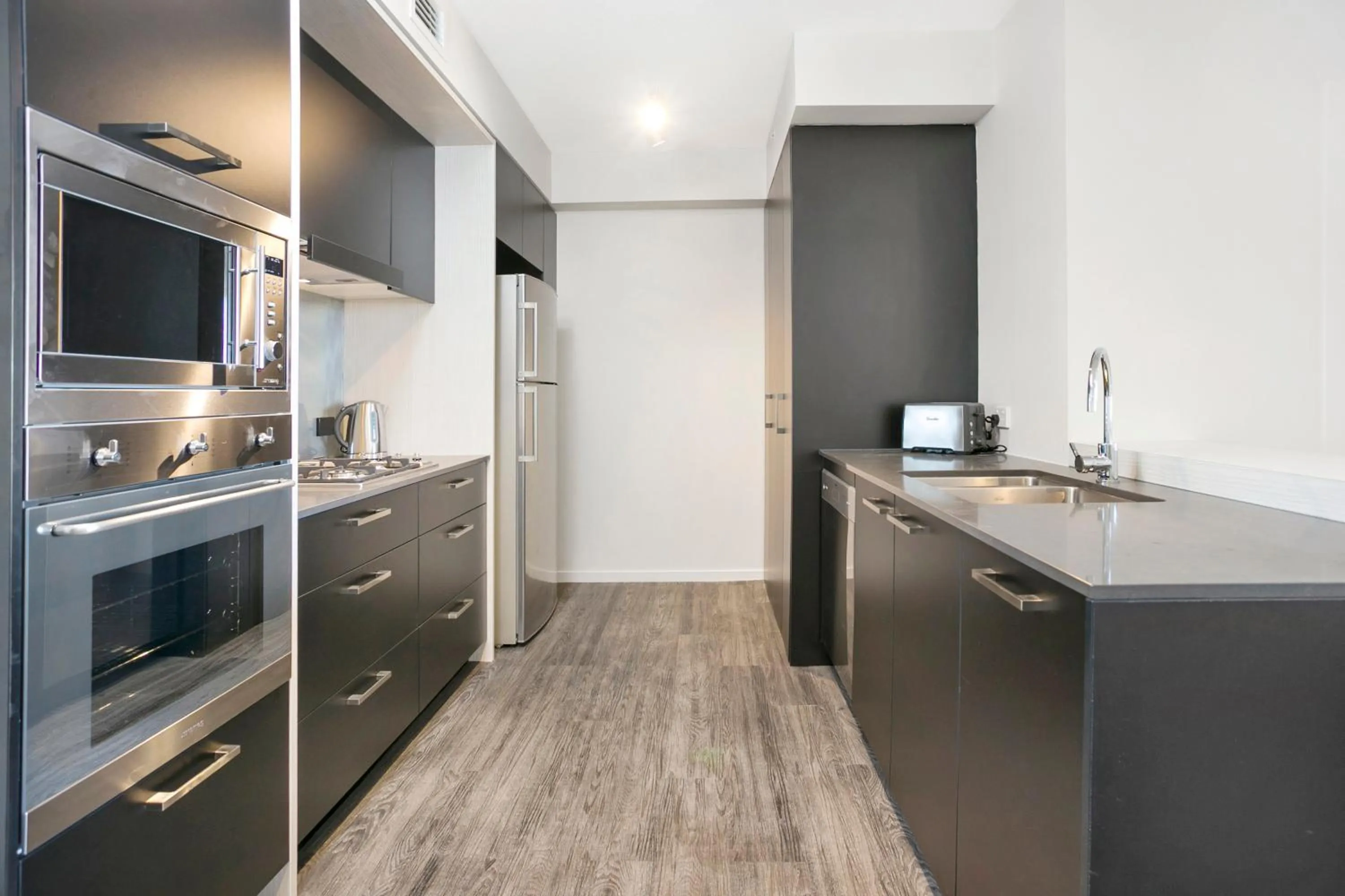 Kitchen or kitchenette in Soda Apartments by CLLIX