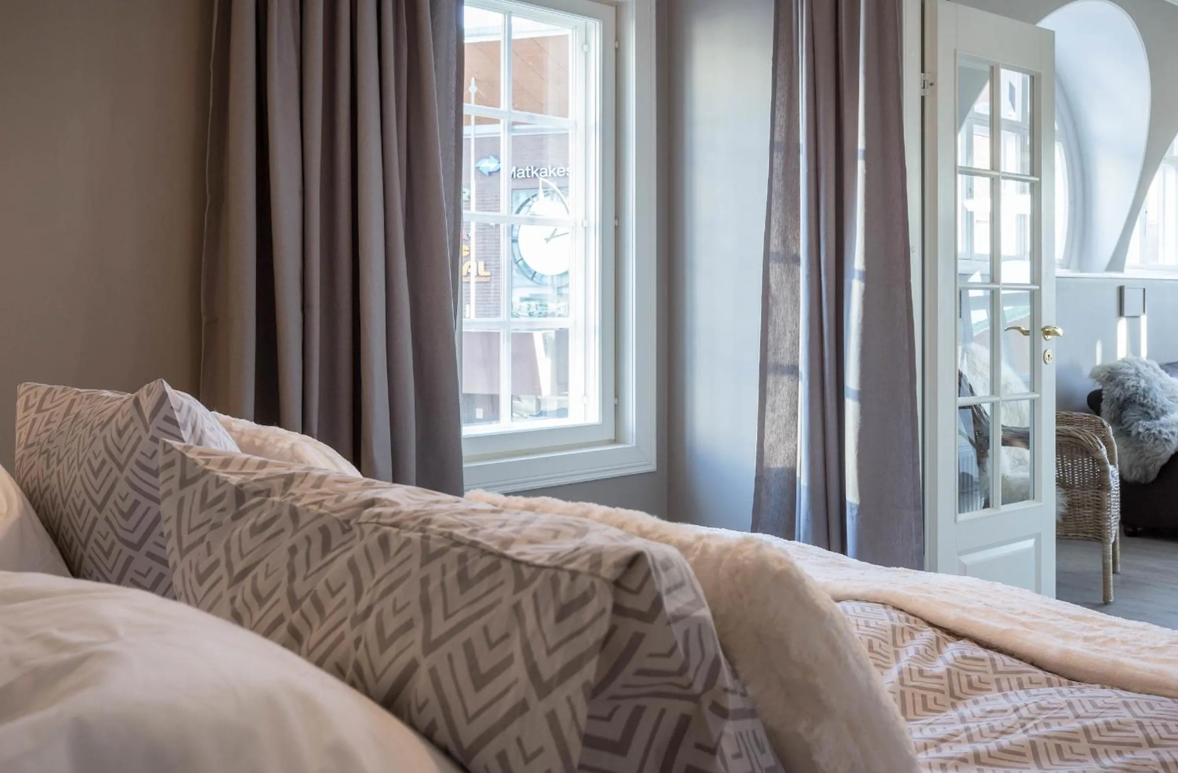 Bed in Harmooni Suites