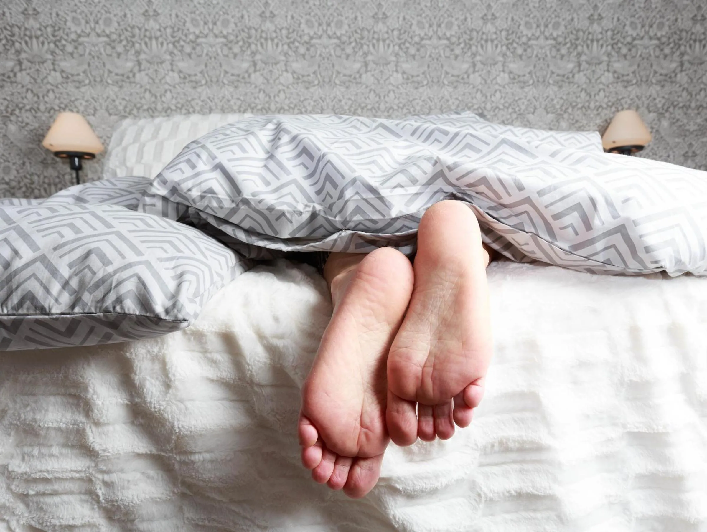 Bed in Harmooni Suites