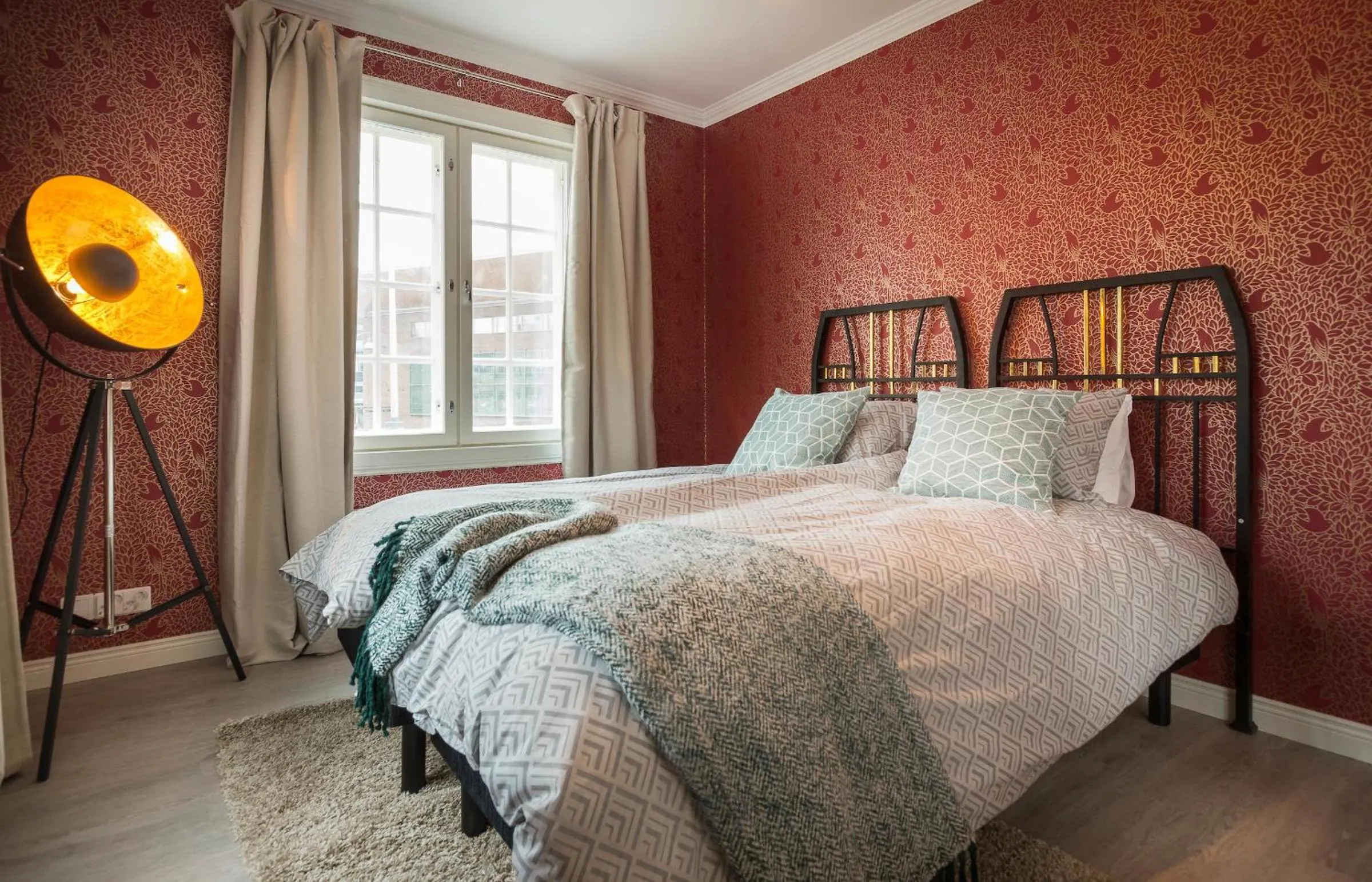 Bed in Harmooni Suites