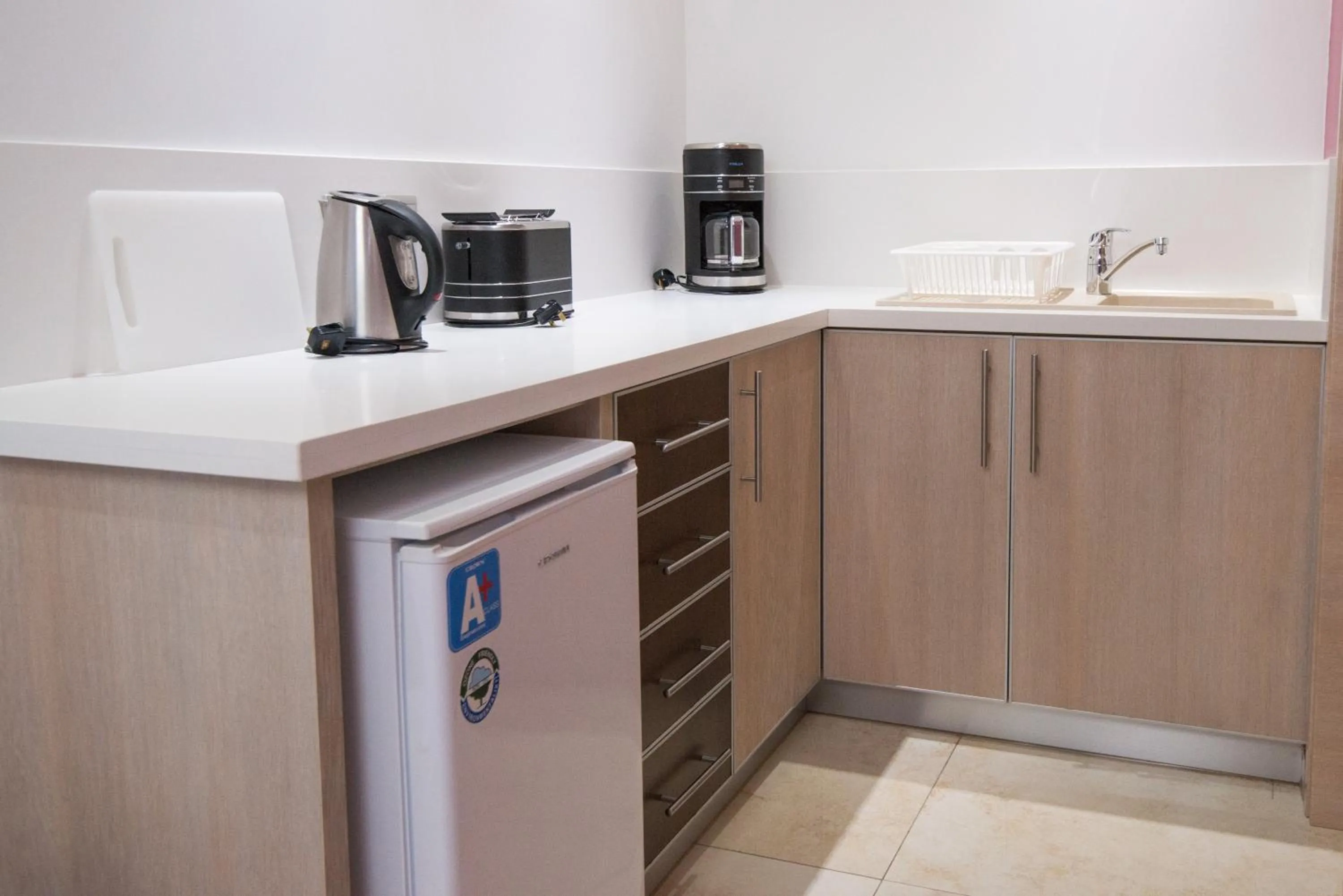 Kitchen or kitchenette in Loutsiana Deluxe Apts