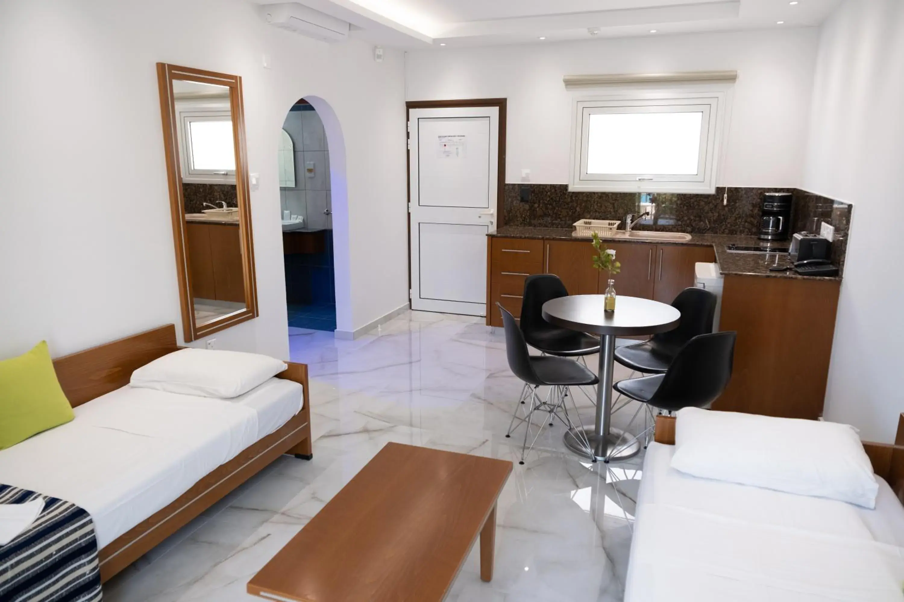 Kitchen or kitchenette, Bed in Loutsiana Deluxe Apts Kitchen or kitchenette, Bed in Loutsiana Deluxe Apts