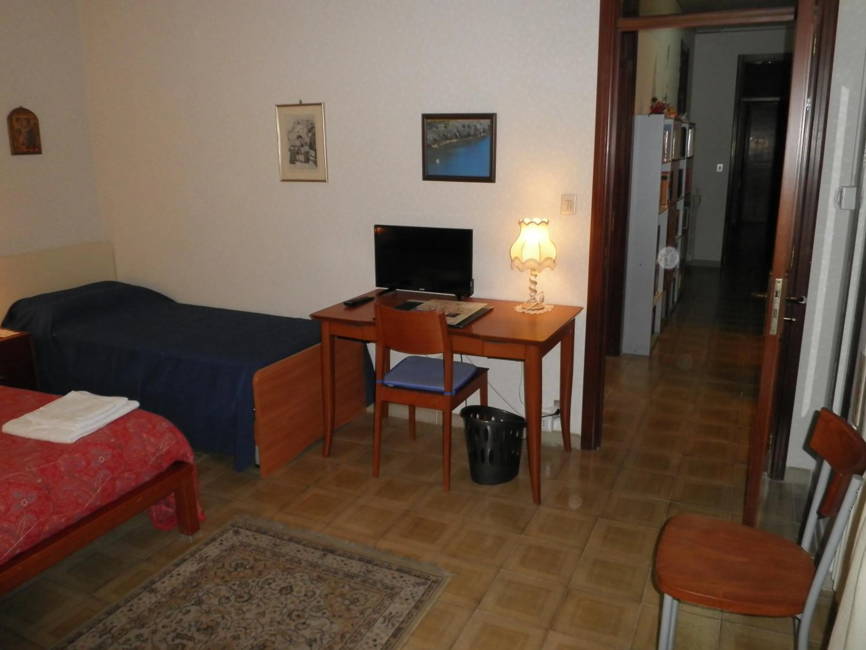 Photo of the whole room, Bed in Don Milani