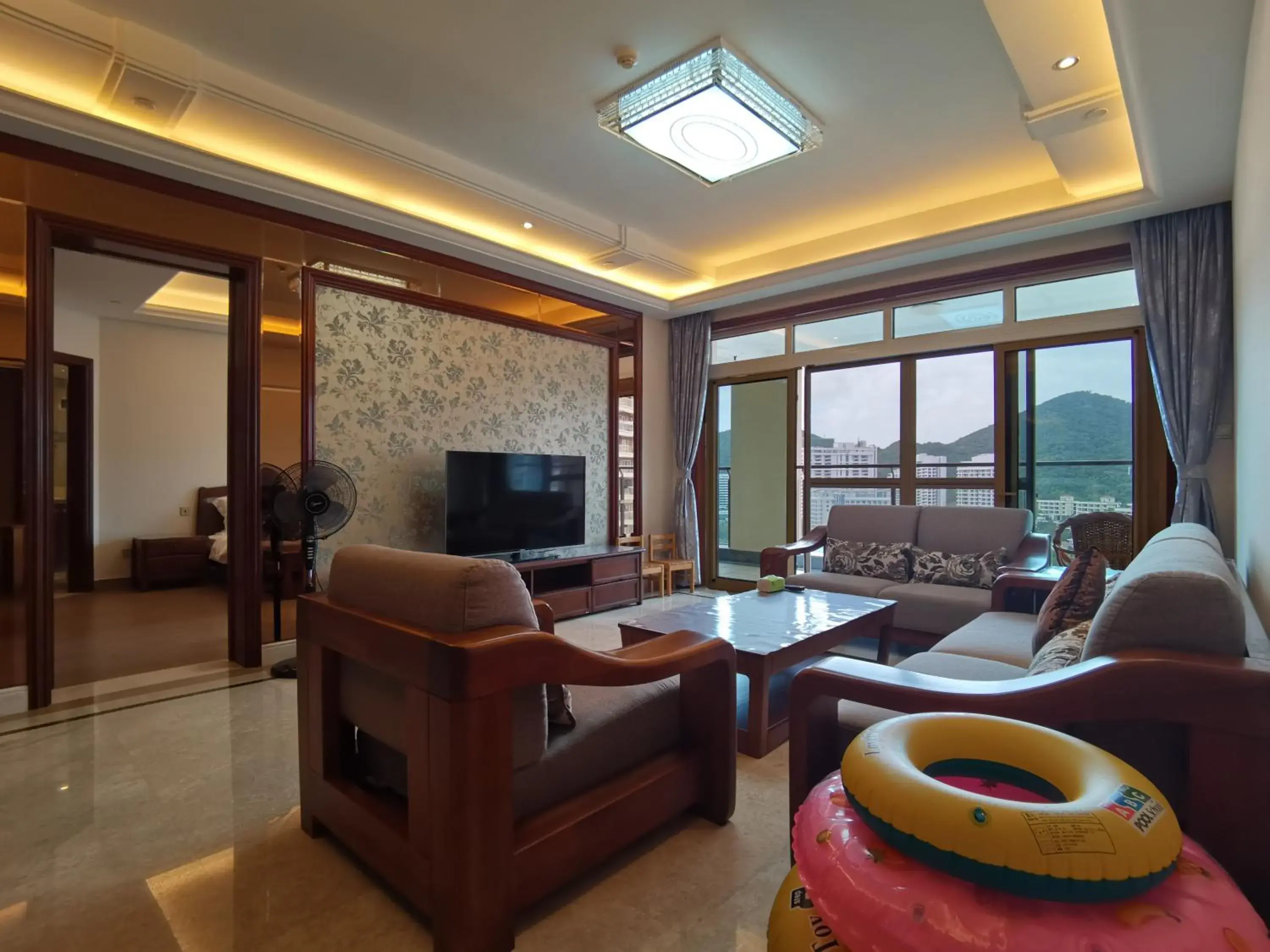 Living room in Sanya Yikehai View Apartments Living room in Sanya Yikehai View Apartments