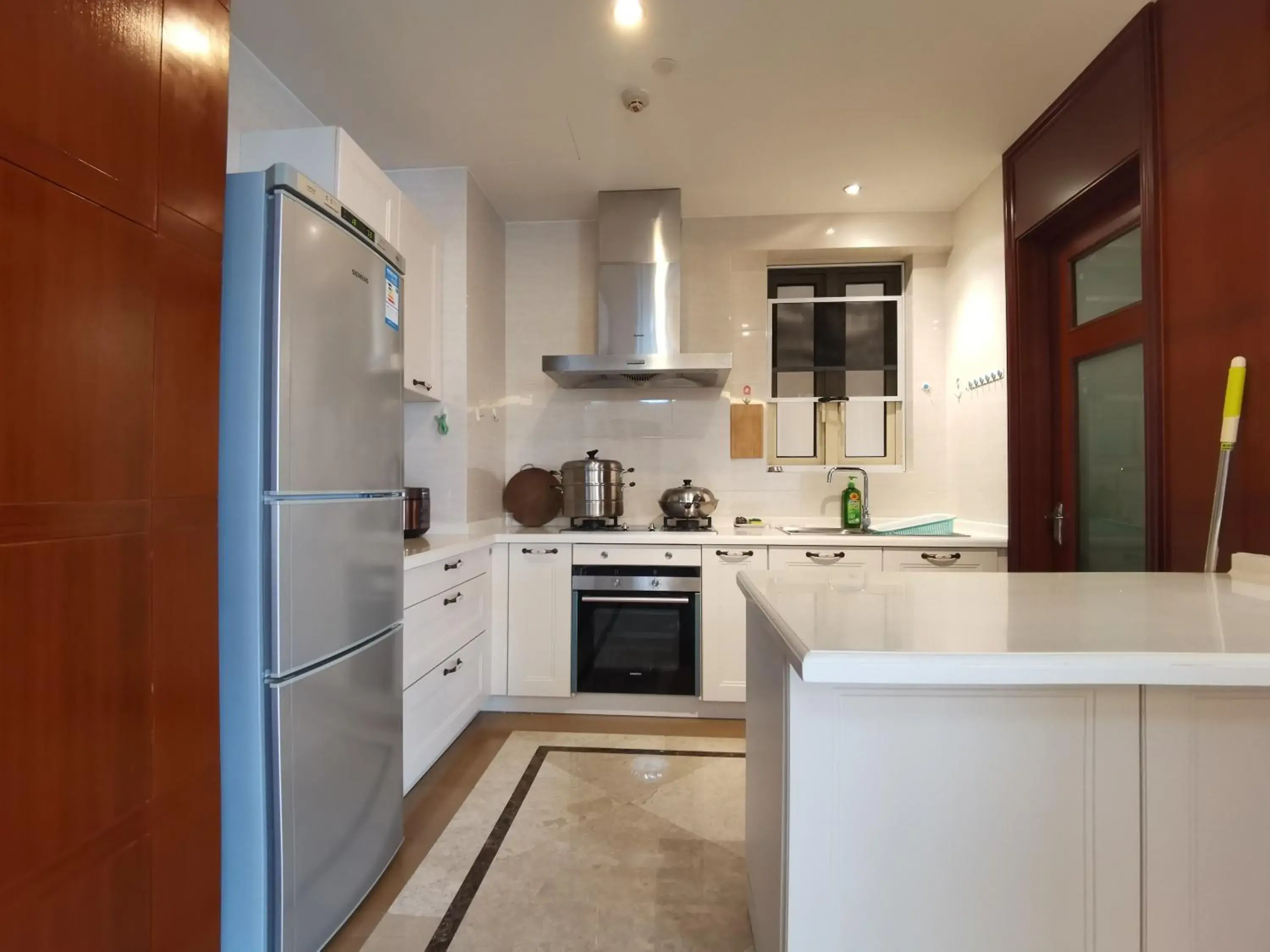 Kitchen or kitchenette in Sanya Yikehai View Apartments Kitchen or kitchenette in Sanya Yikehai View Apartments