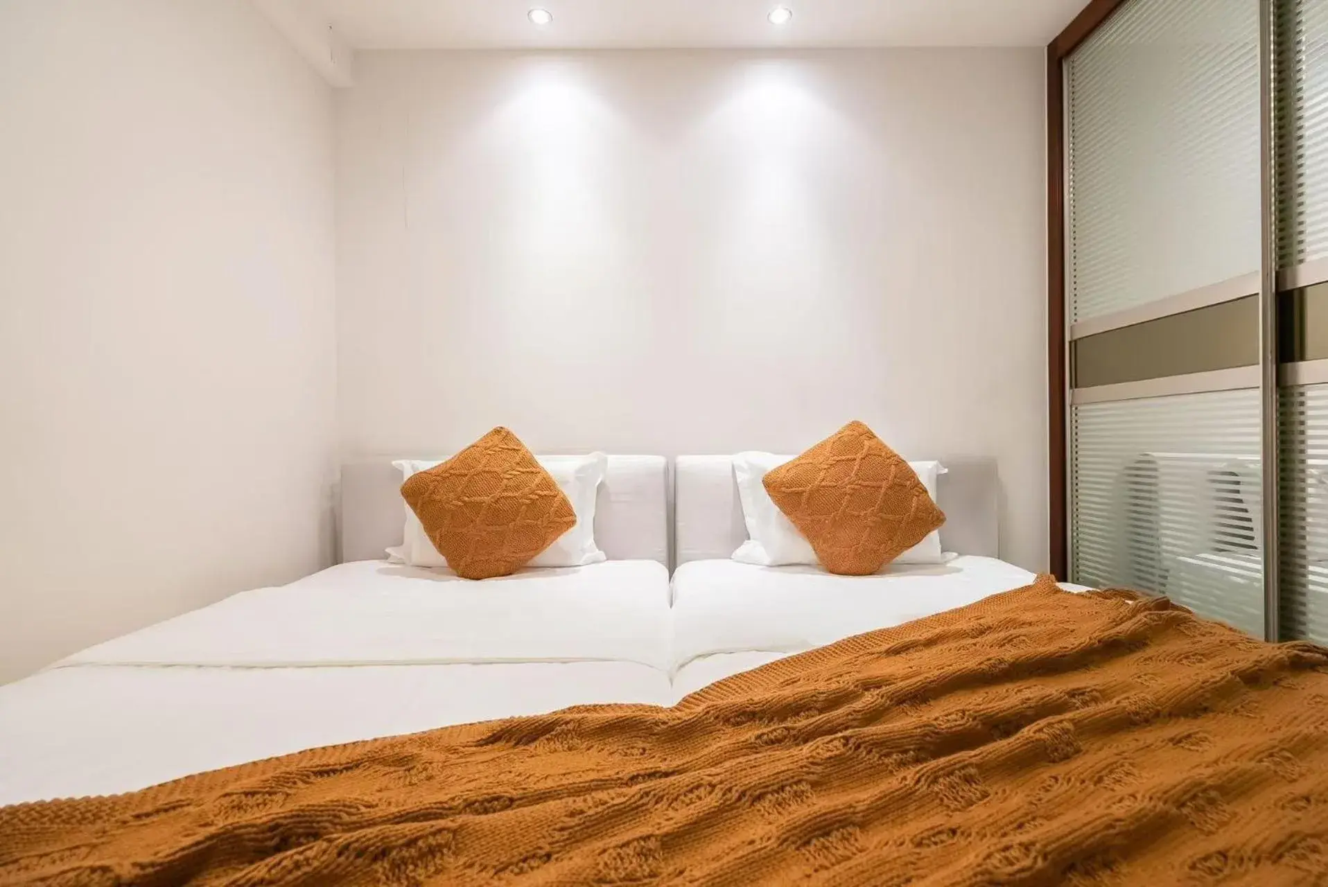 Bed in Sanya Yikehai View Apartments Bed in Sanya Yikehai View Apartments