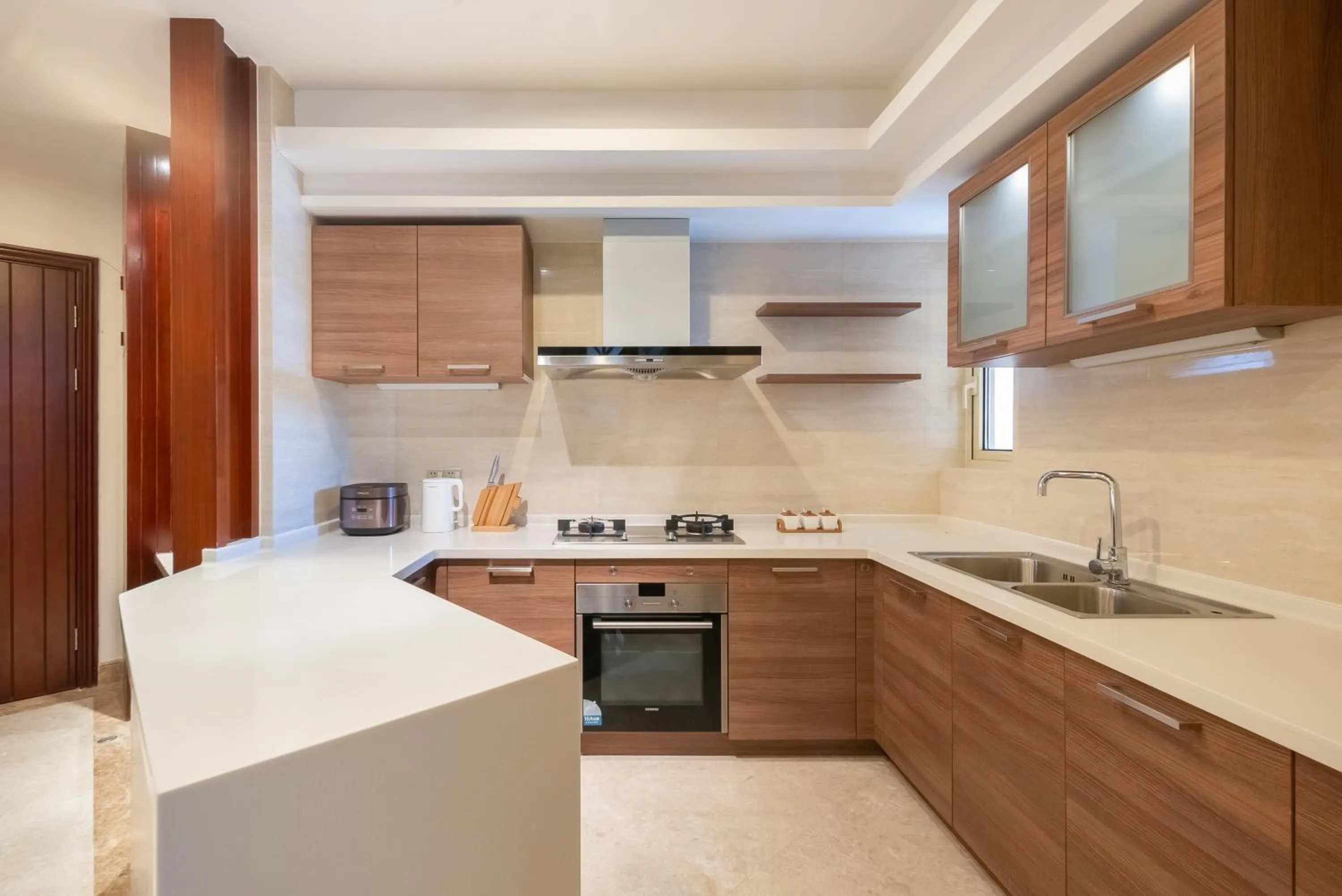 Kitchen or kitchenette in Sanya Yikehai View Apartments