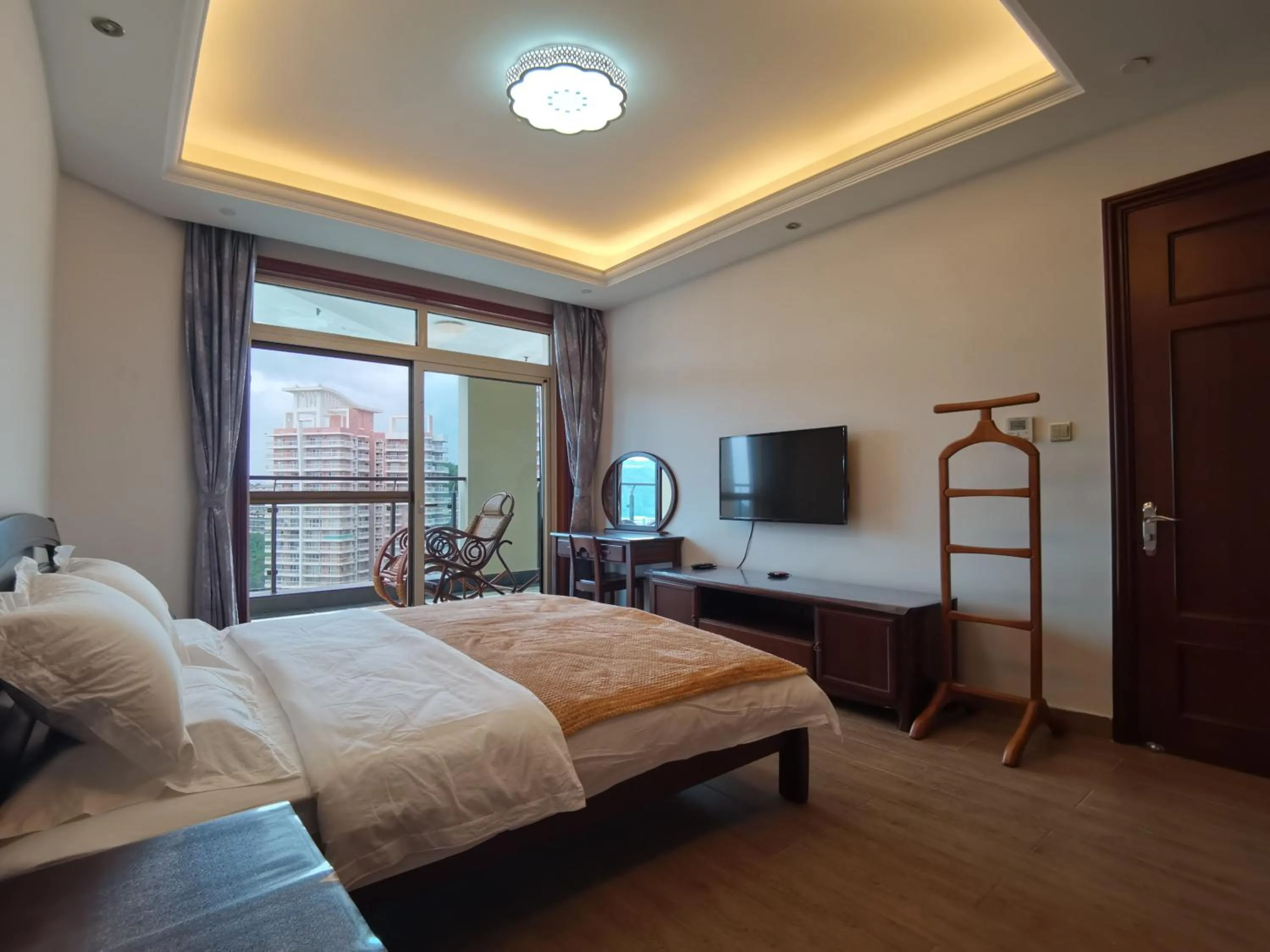 Bedroom, Bed in Sanya Yikehai View Apartments