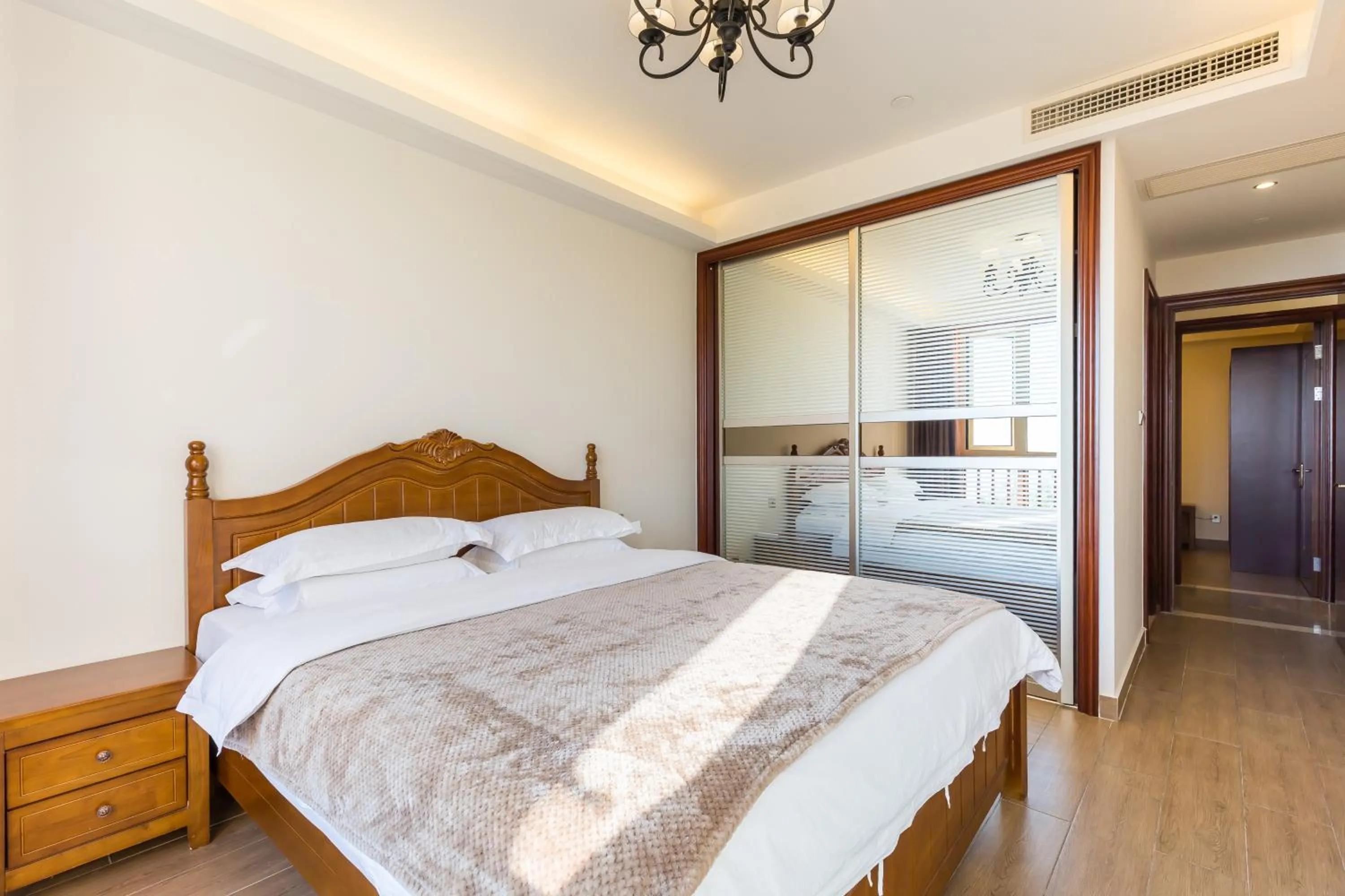 Bedroom, Bed in Sanya Yikehai View Apartments