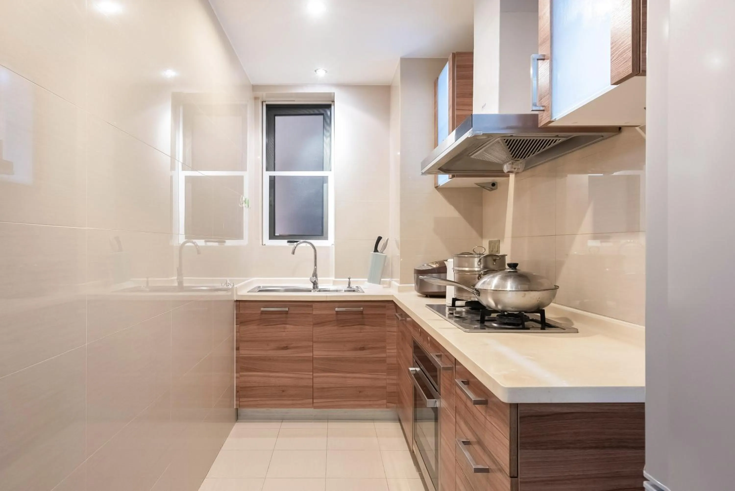 Kitchen or kitchenette in Sanya Yikehai View Apartments