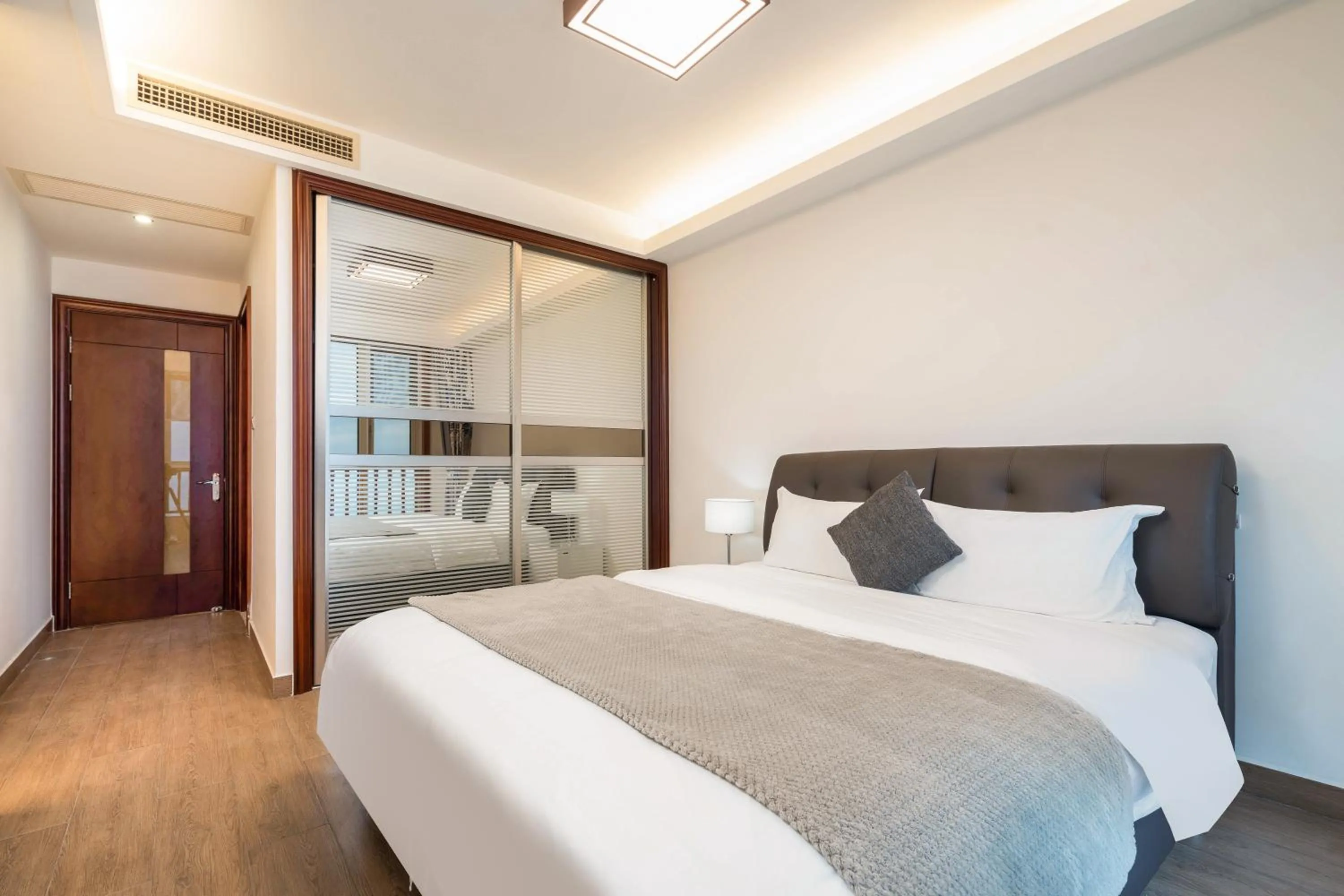 Bedroom, Bed in Sanya Yikehai View Apartments