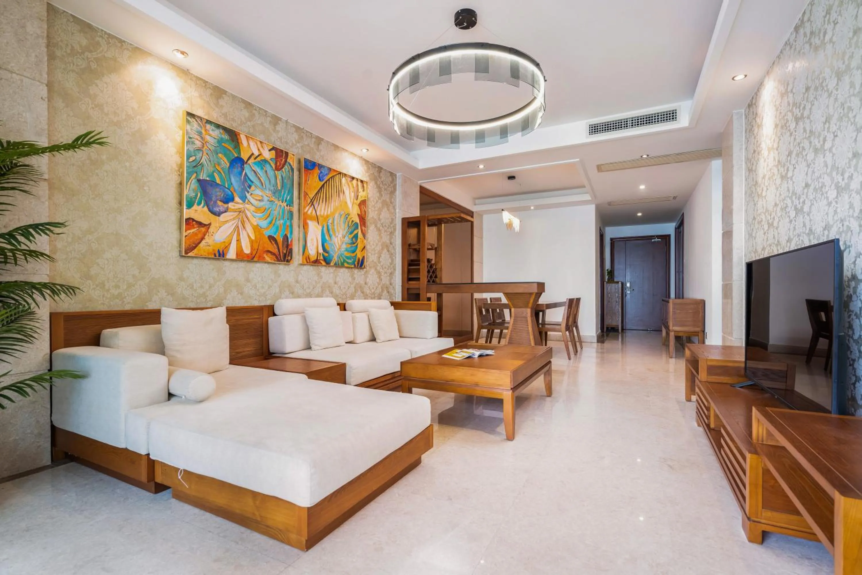 Living room, Bed in Sanya Yikehai View Apartments