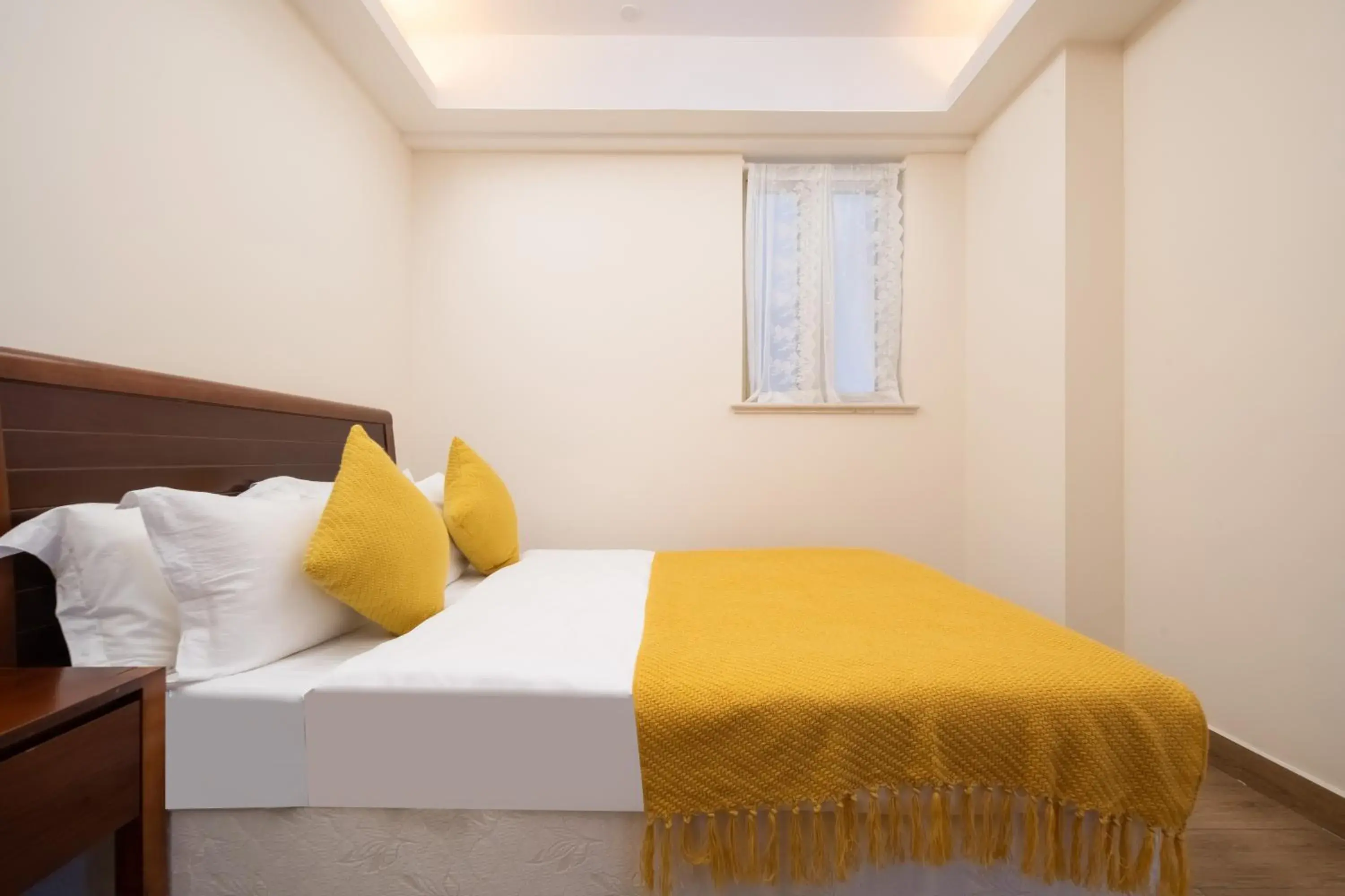 Bed in Sanya Yikehai View Apartments Bed in Sanya Yikehai View Apartments