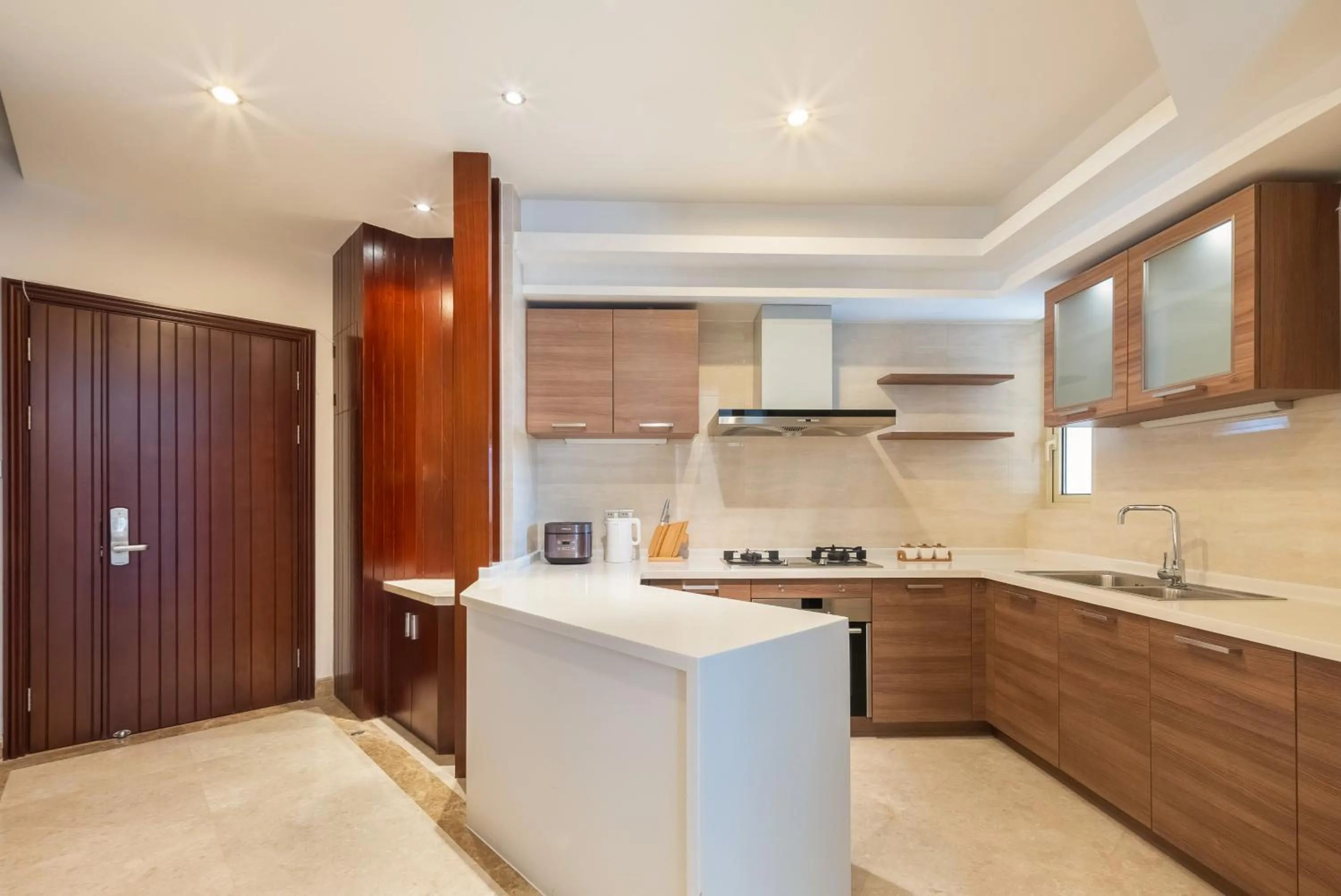 Kitchen or kitchenette in Sanya Yikehai View Apartments
