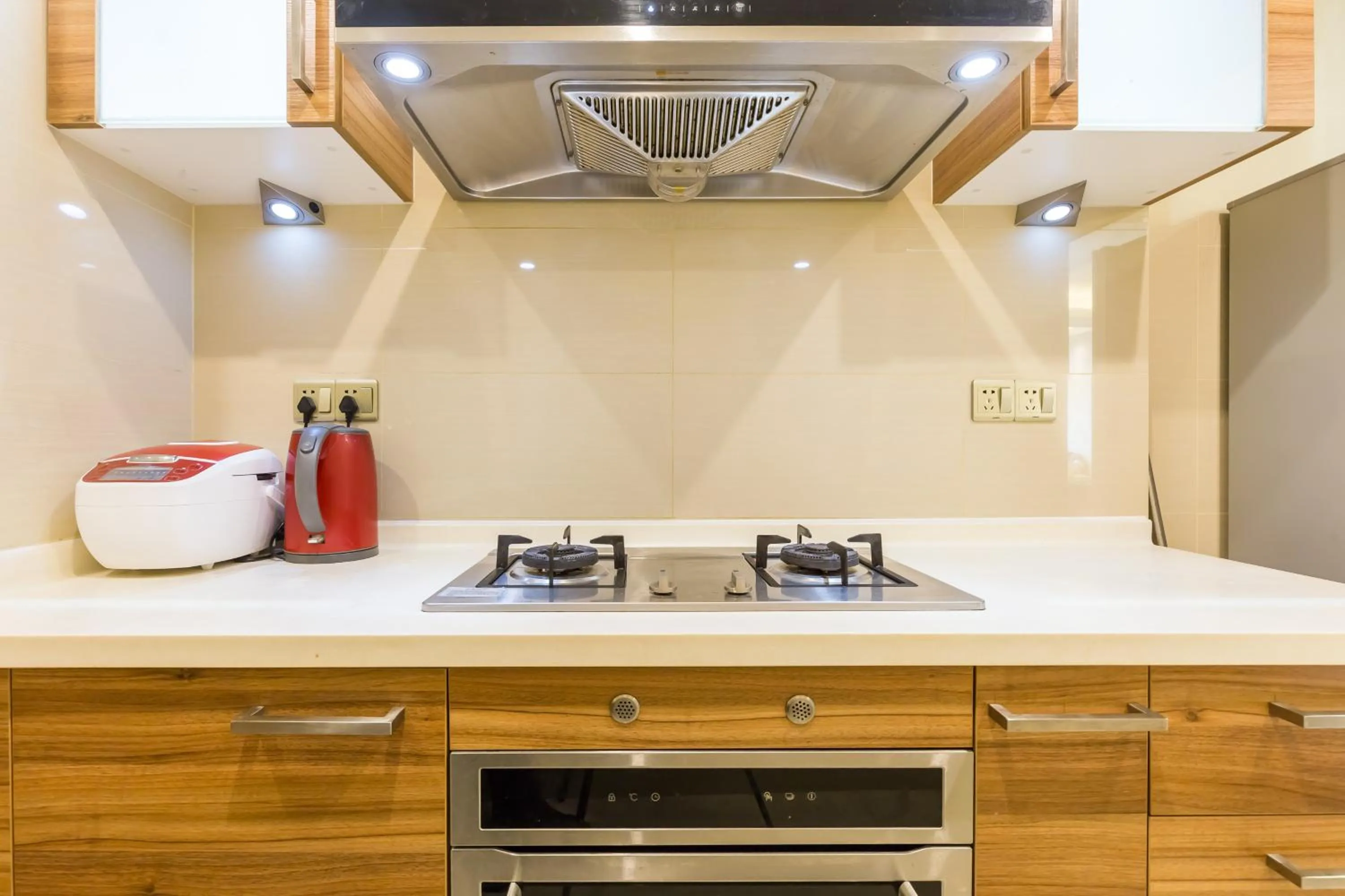 Kitchen or kitchenette in Sanya Yikehai View Apartments