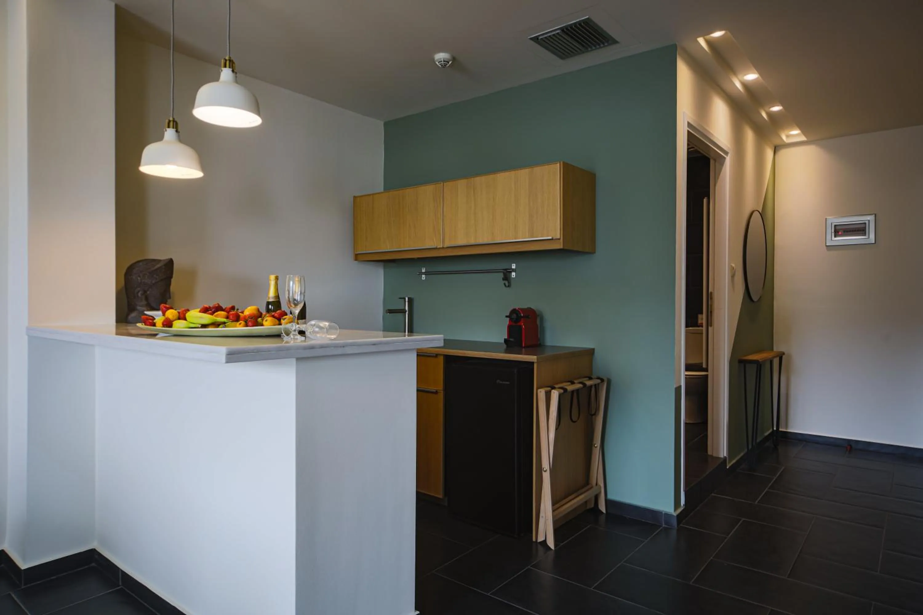 Kitchen or kitchenette in Elite Ermou Suites
