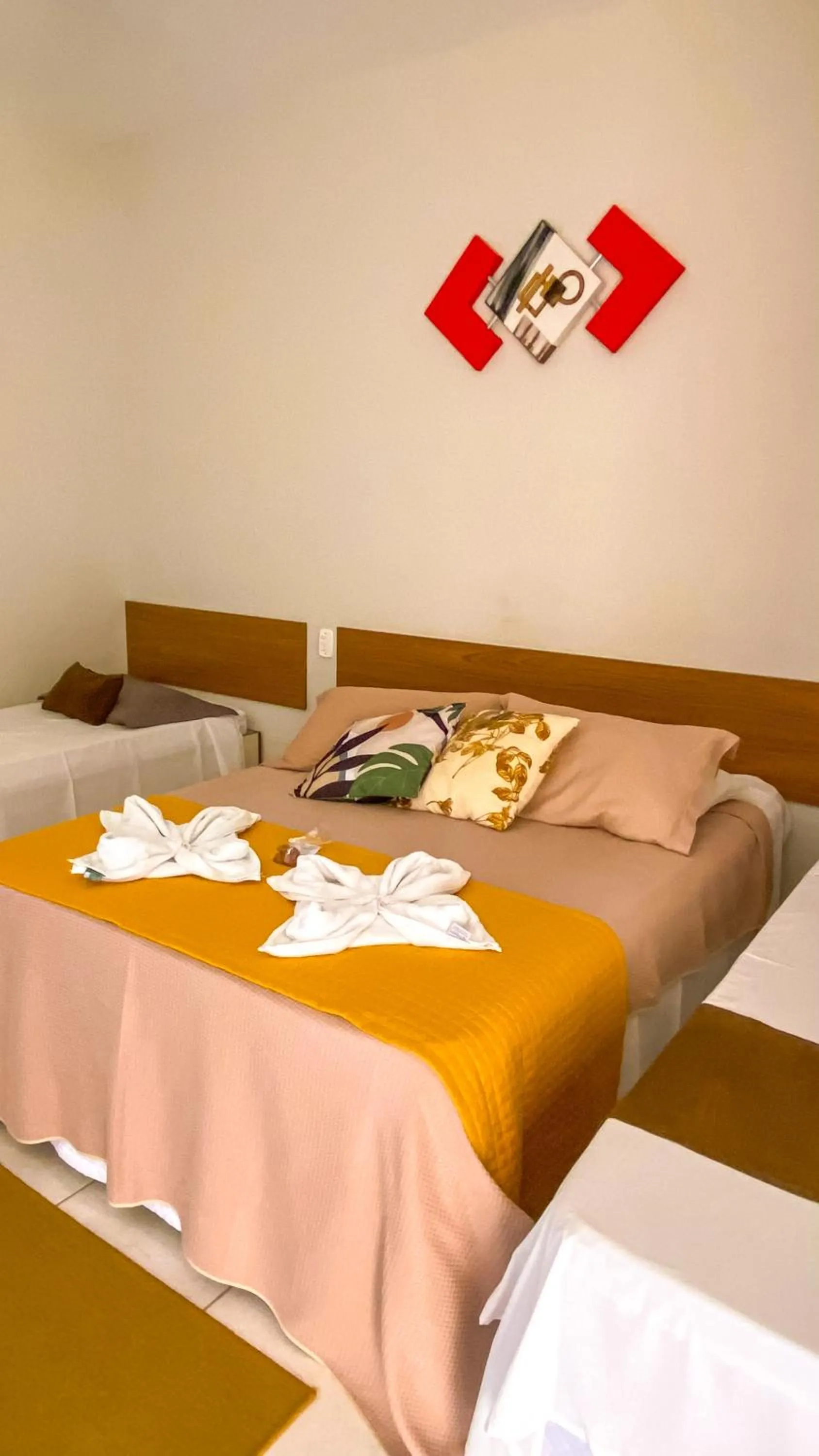 Bed in Pousada Flores do Campo