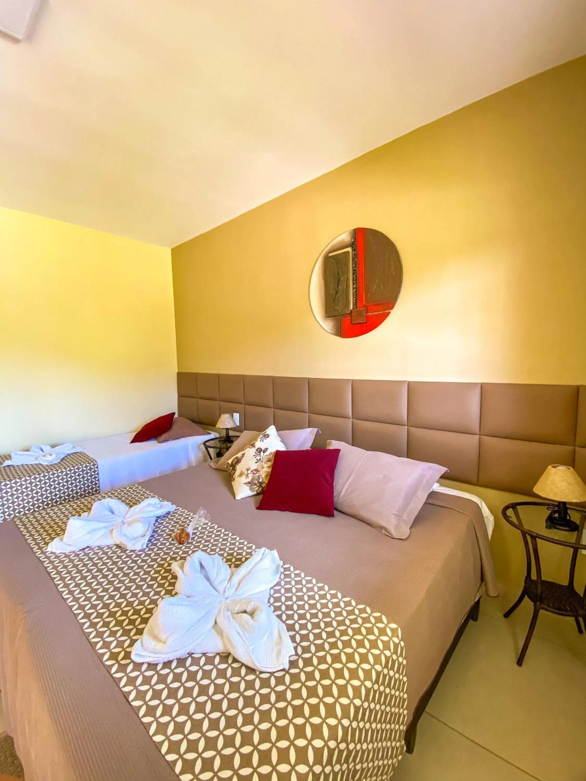 Bed in Pousada Flores do Campo