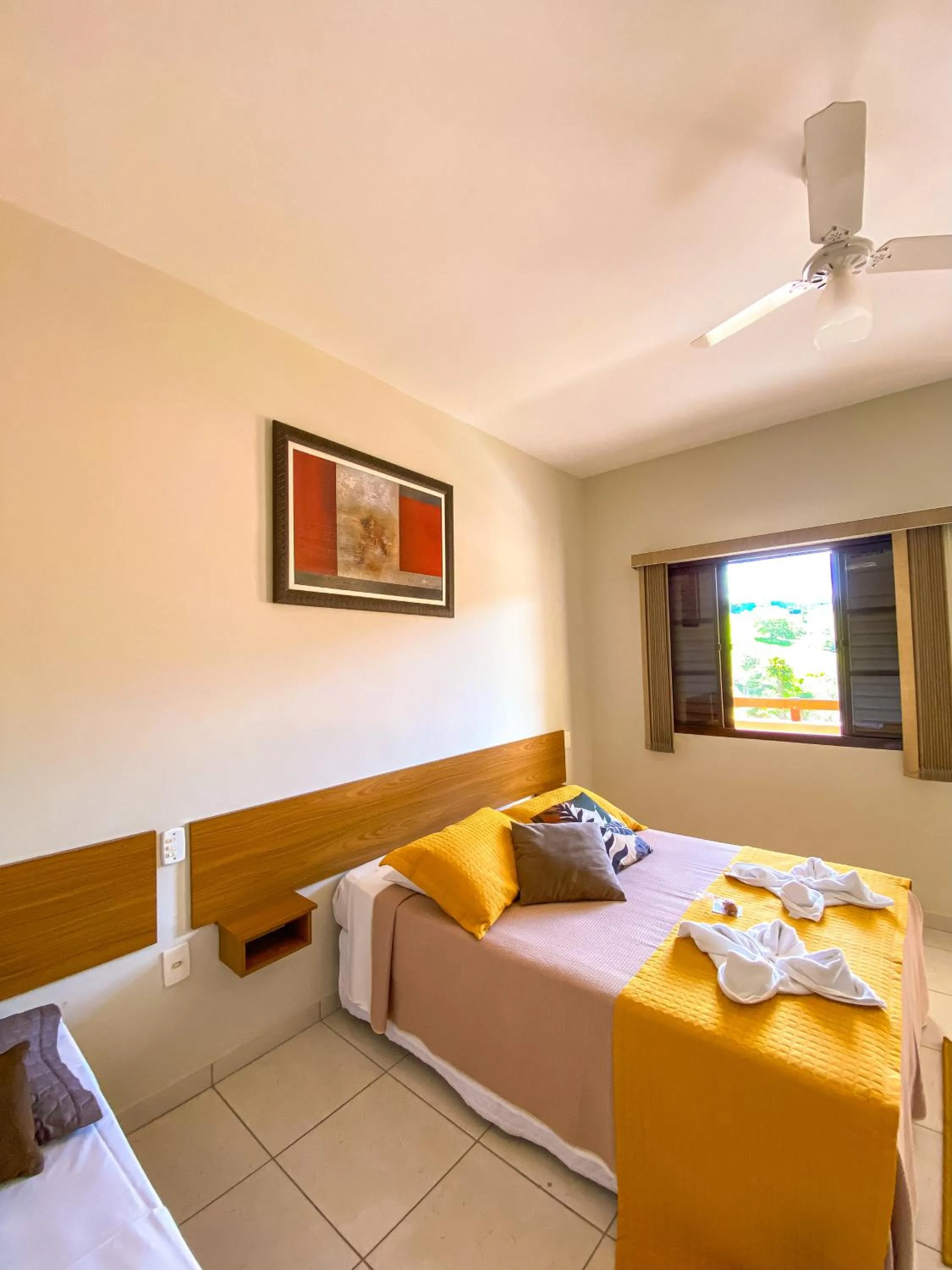 Bed in Pousada Flores do Campo