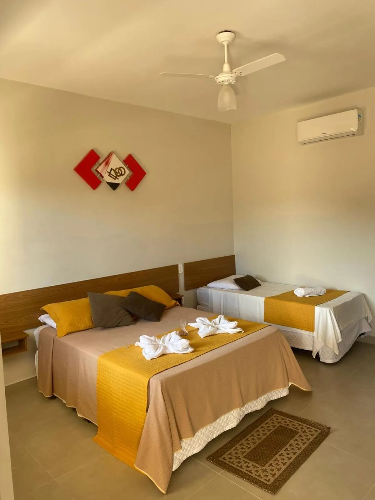 Bed in Pousada Flores do Campo