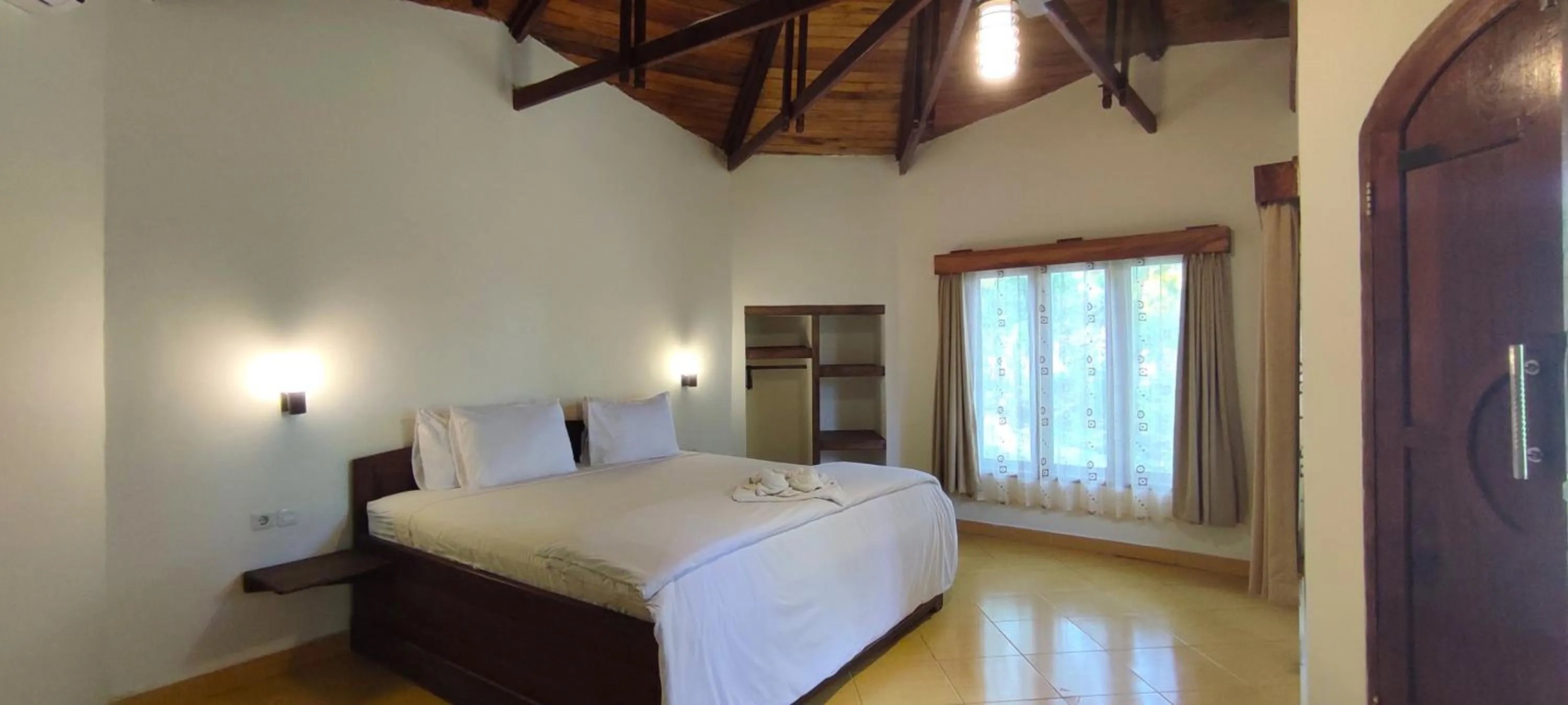 Bedroom, Bed in Bara Beach Bungalows