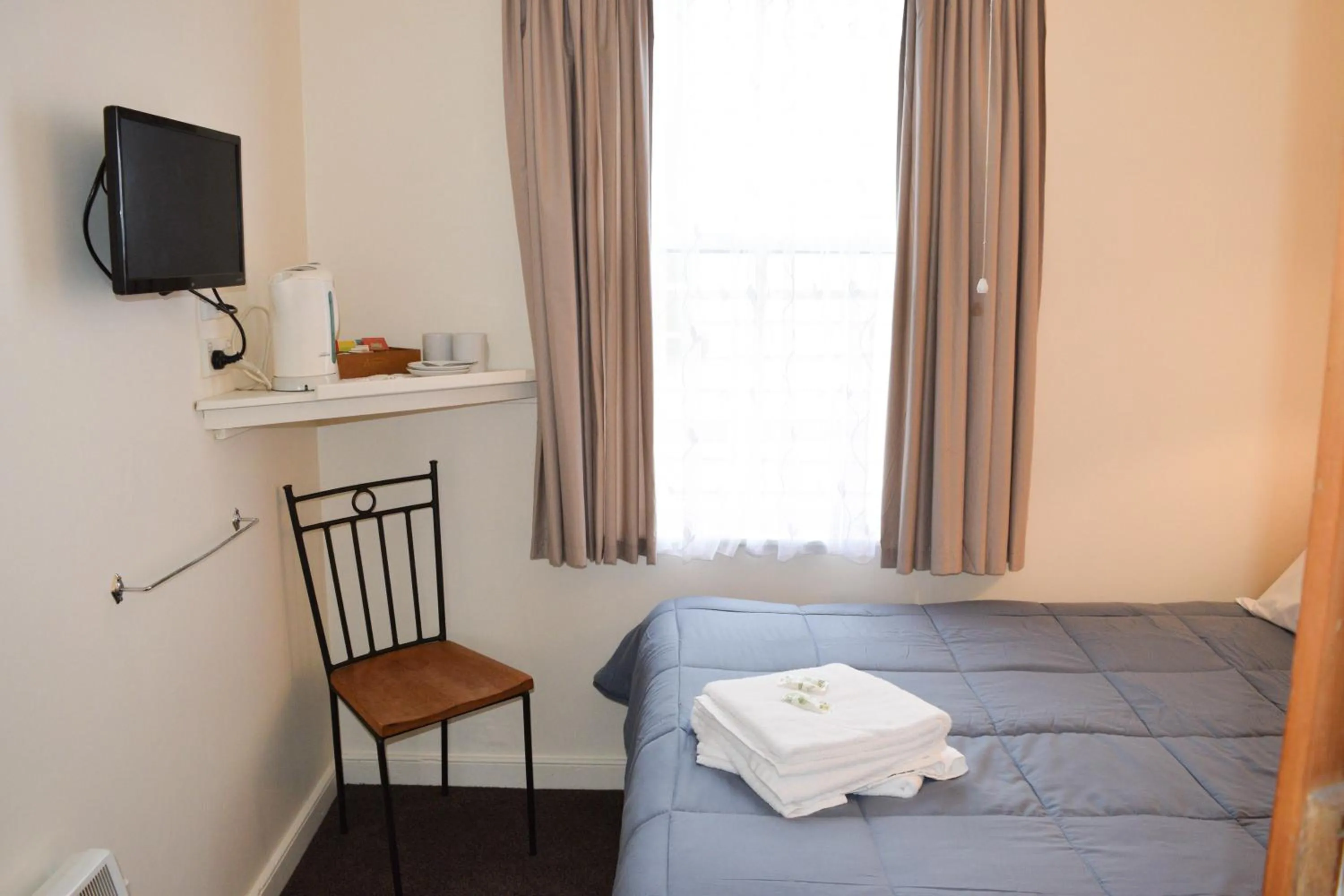 Bed in The Greytown Hotel